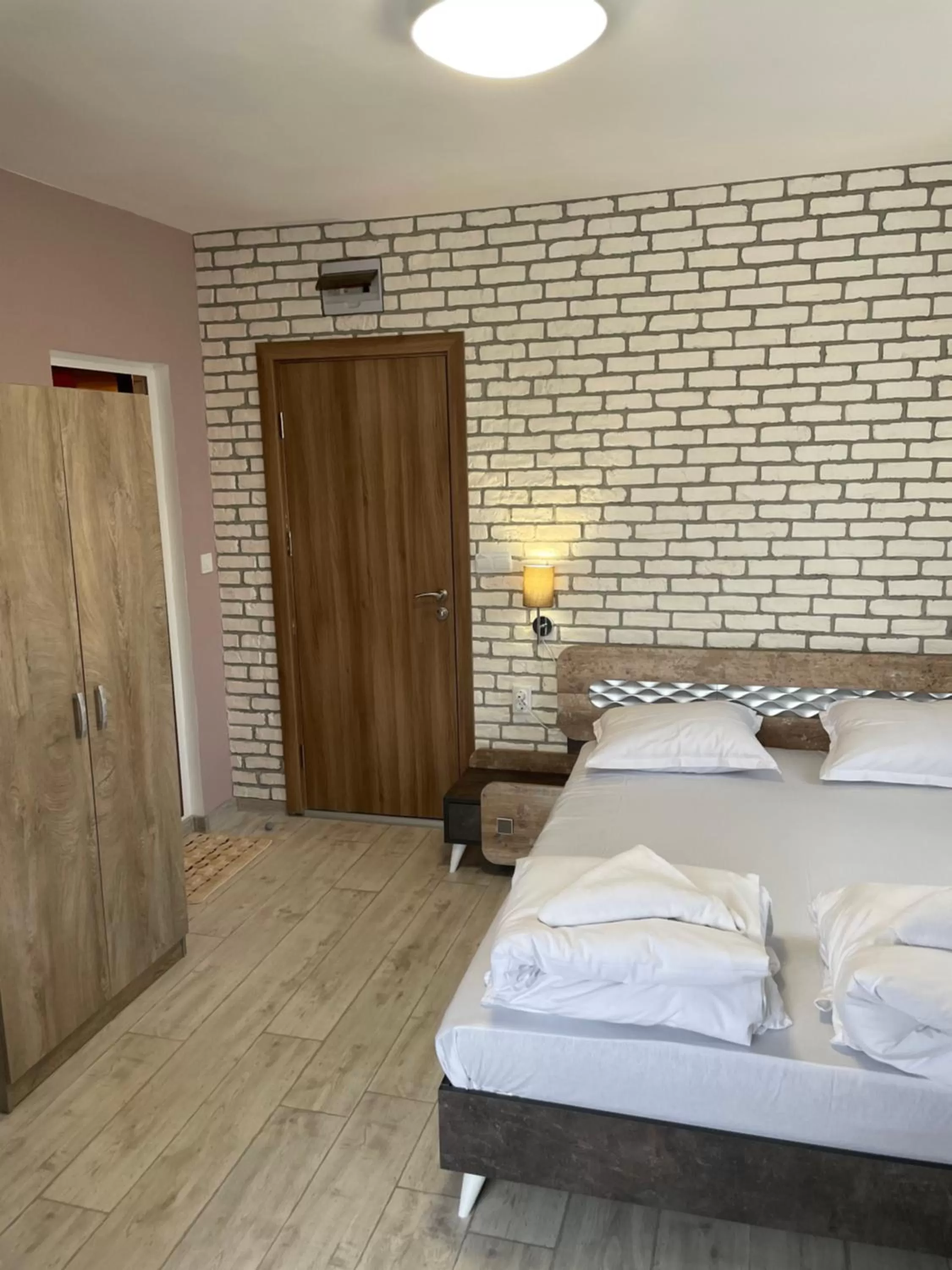 Bed in Family Hotel Malibu