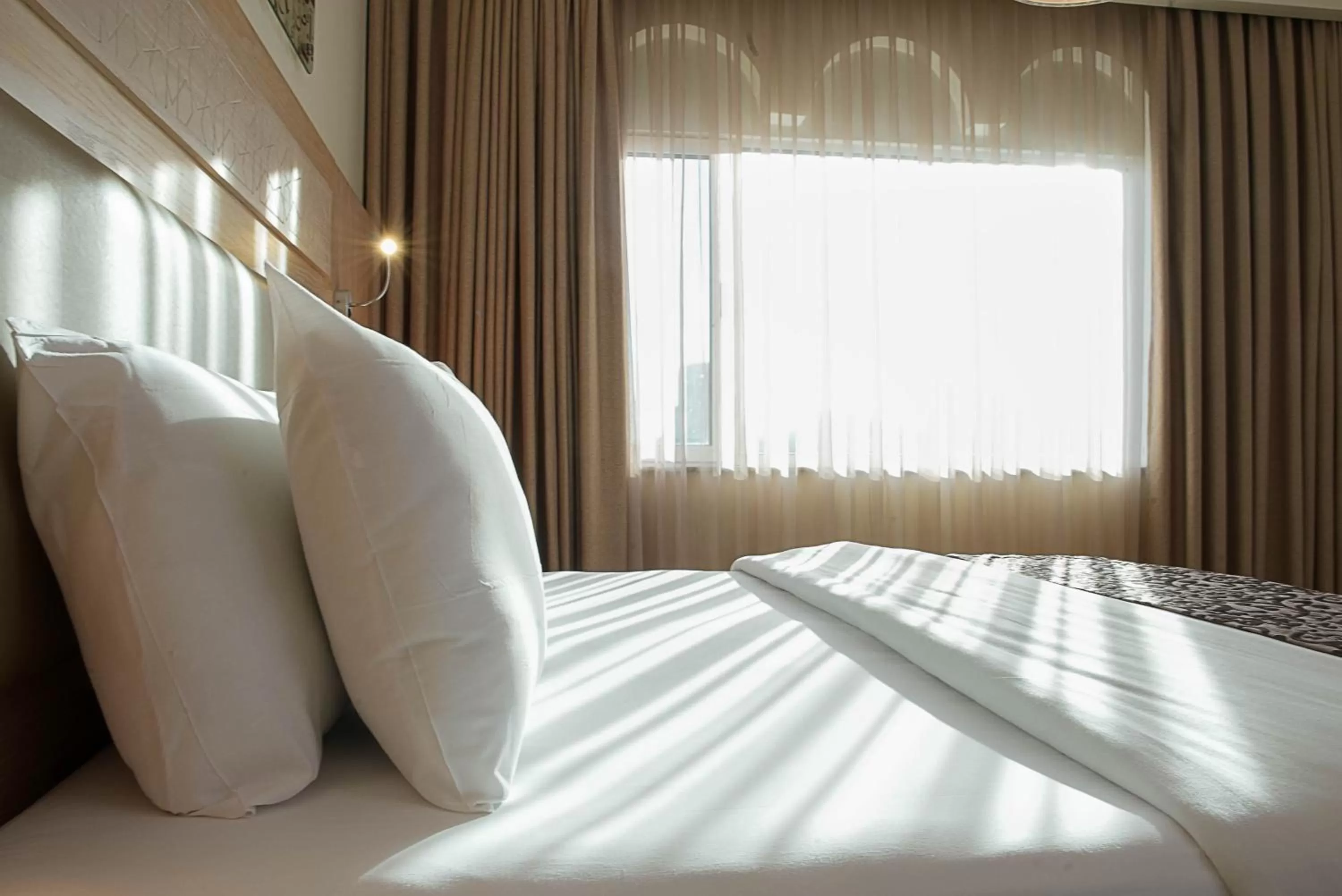 Bed in Toledo Amman Hotel