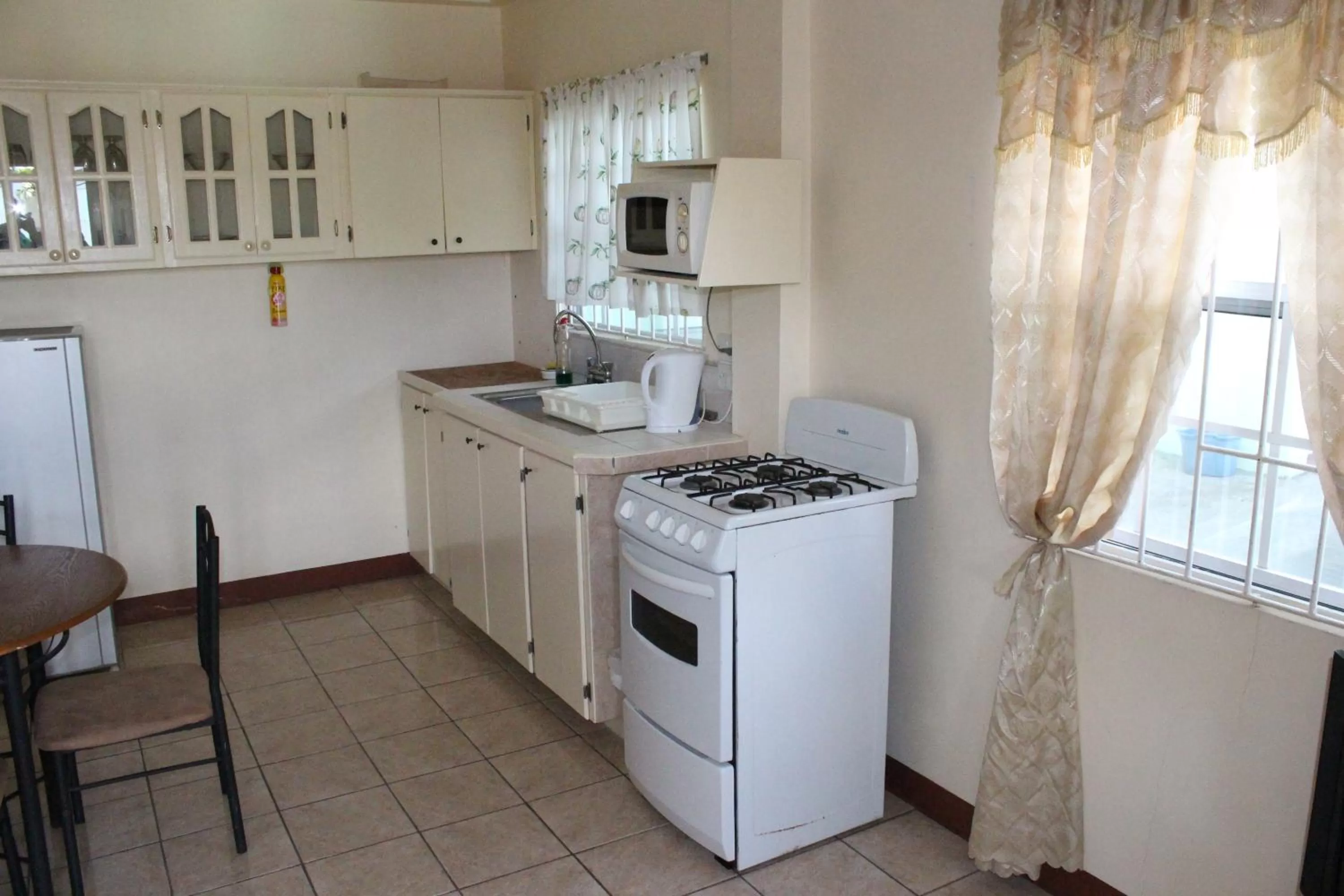 Kitchen or kitchenette, Kitchen/Kitchenette in The Relax Inn