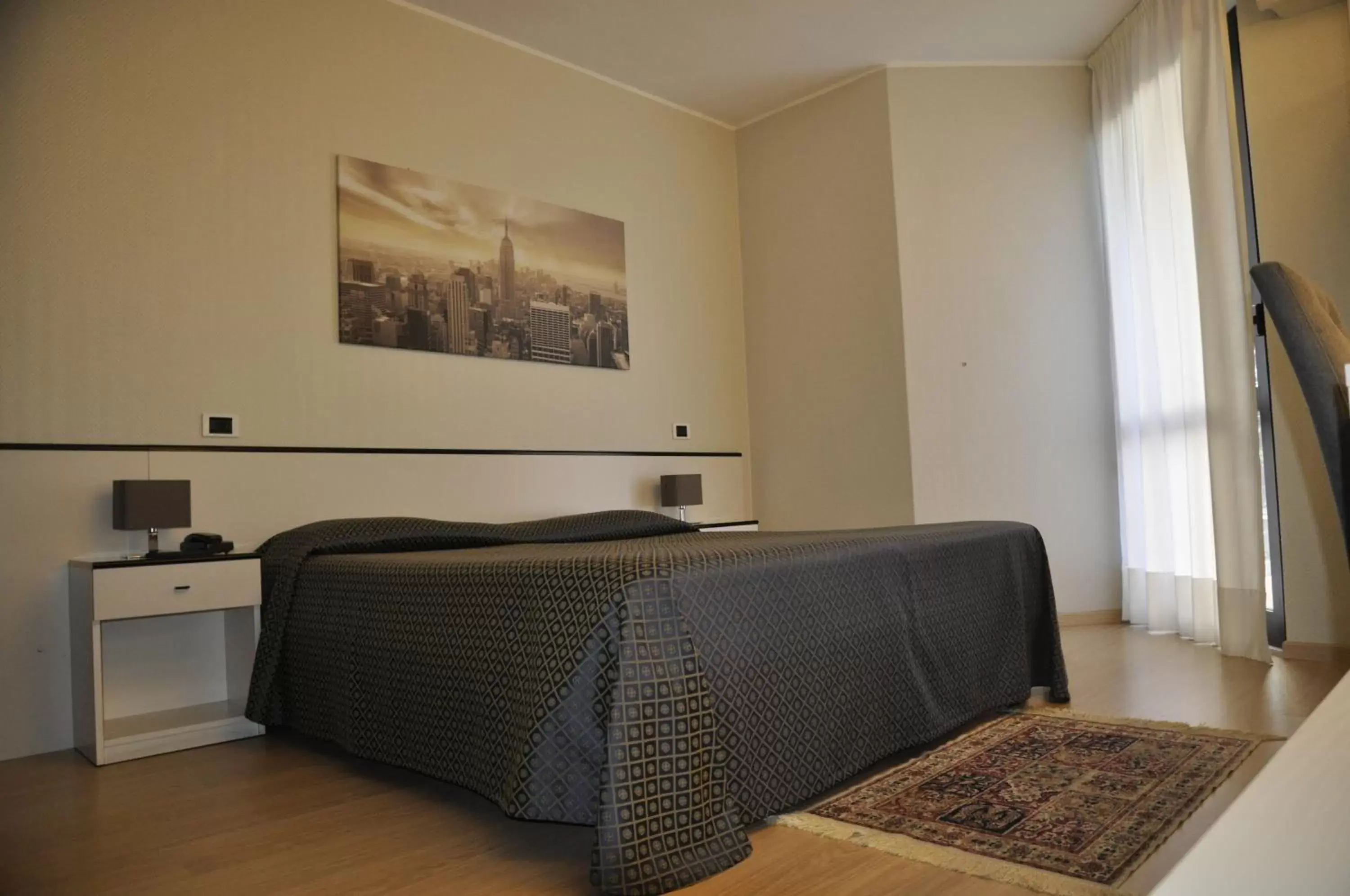 Quadruple Room in Hotel Est Piombino Quadruple Room in Hotel Est Piombino