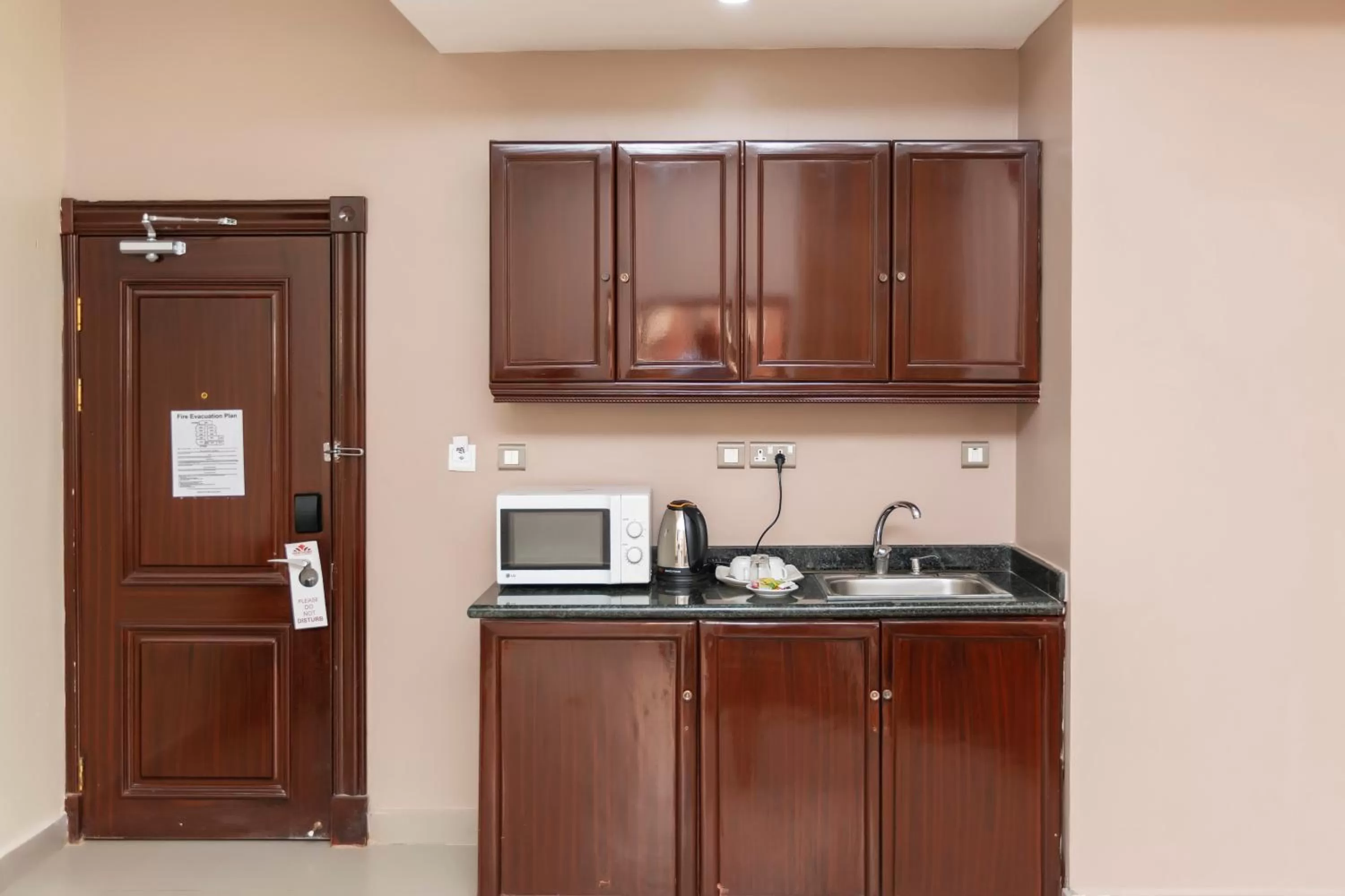 Kitchen or kitchenette in Hawthorn Suites by Wyndham Abuja