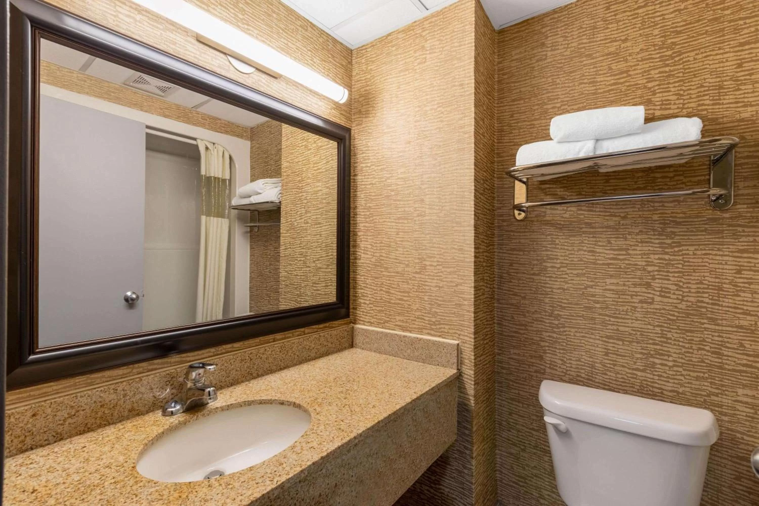 Bathroom in Howard Johnson by Wyndham Gillette