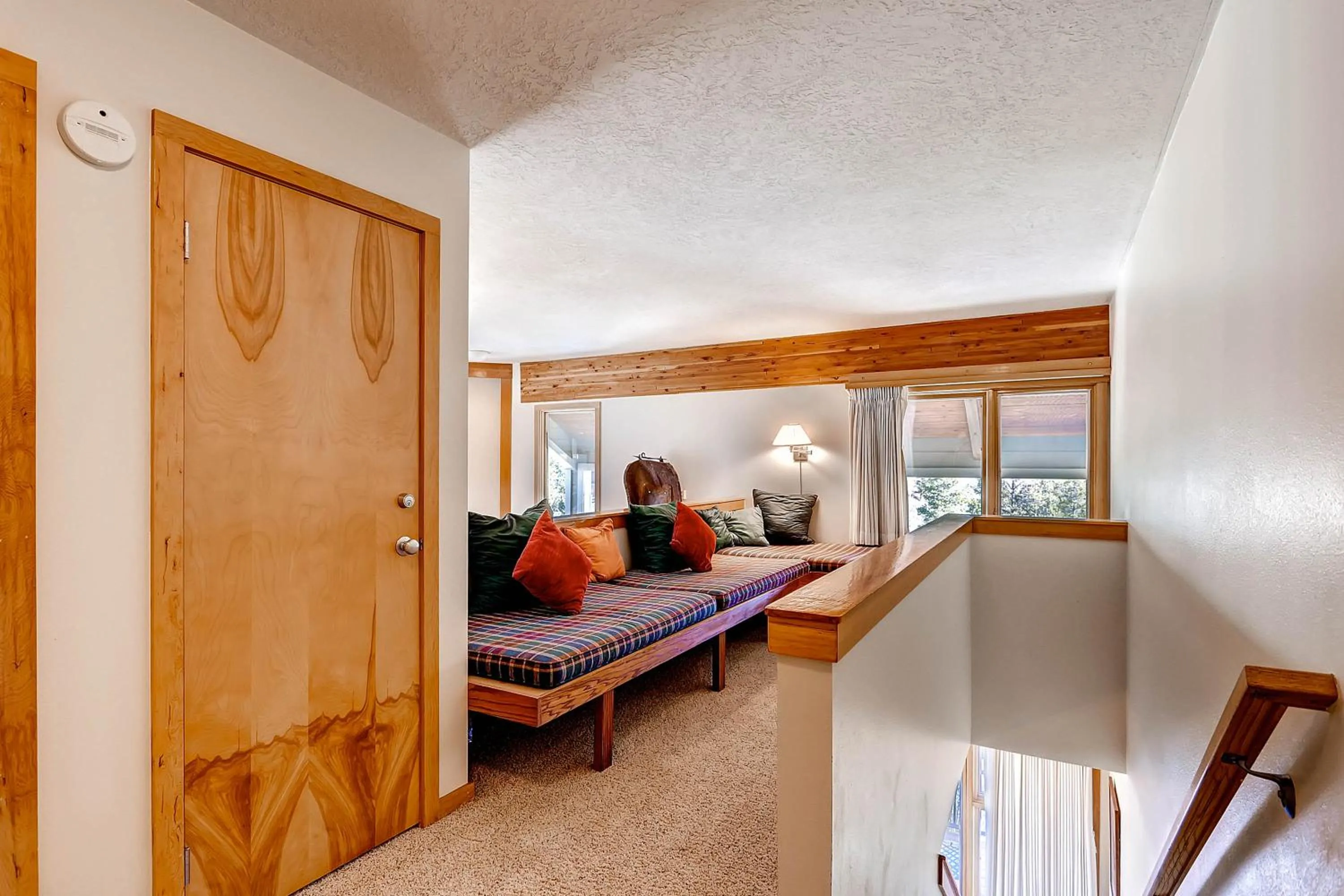 Bed in Evergreen Condominiums by Vail Resorts