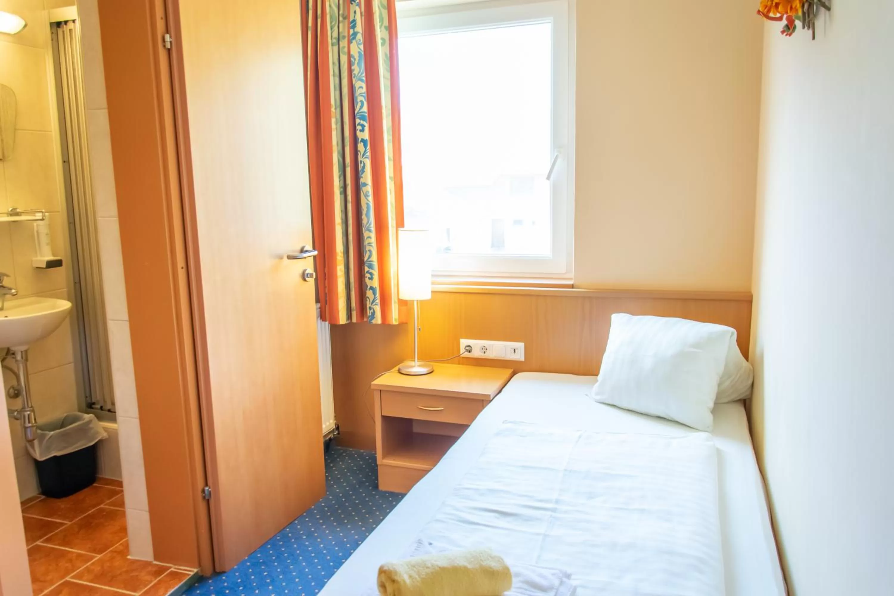 Bed in Strandhotel Burgstaller