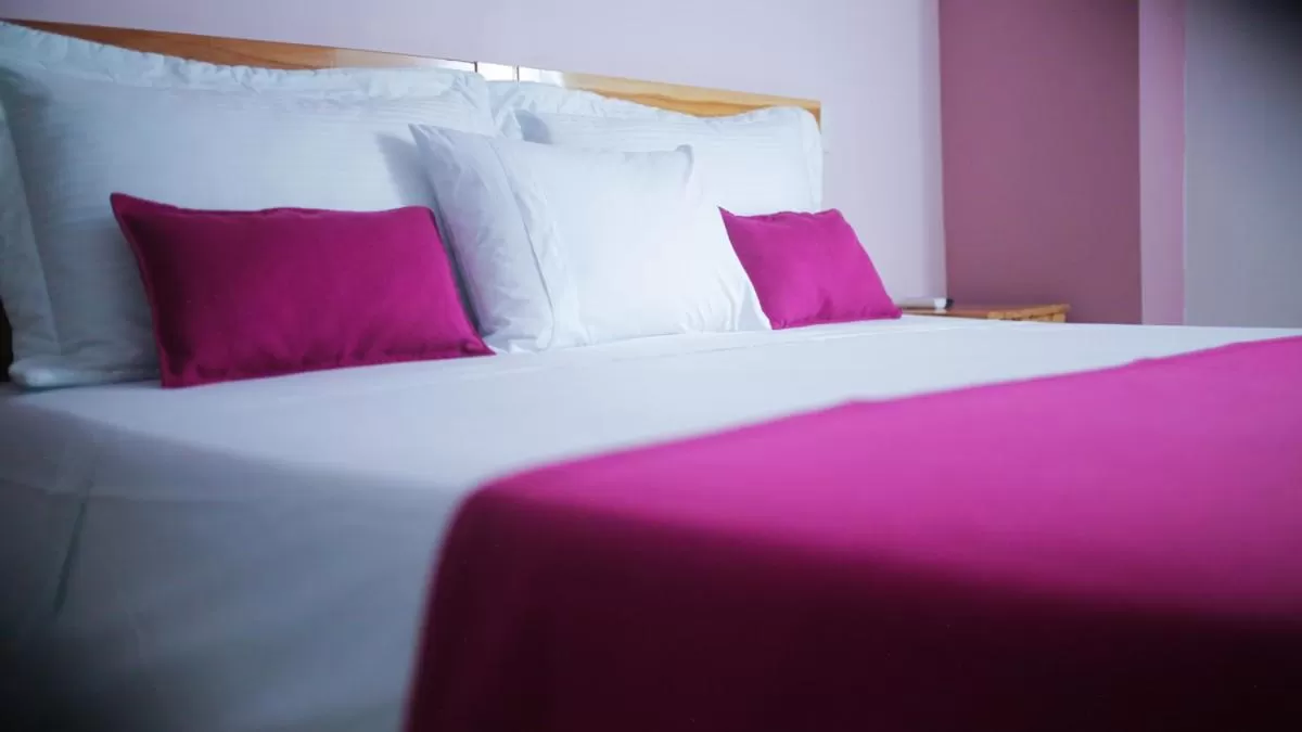 Bed in Kamaleb Farallones Hotel