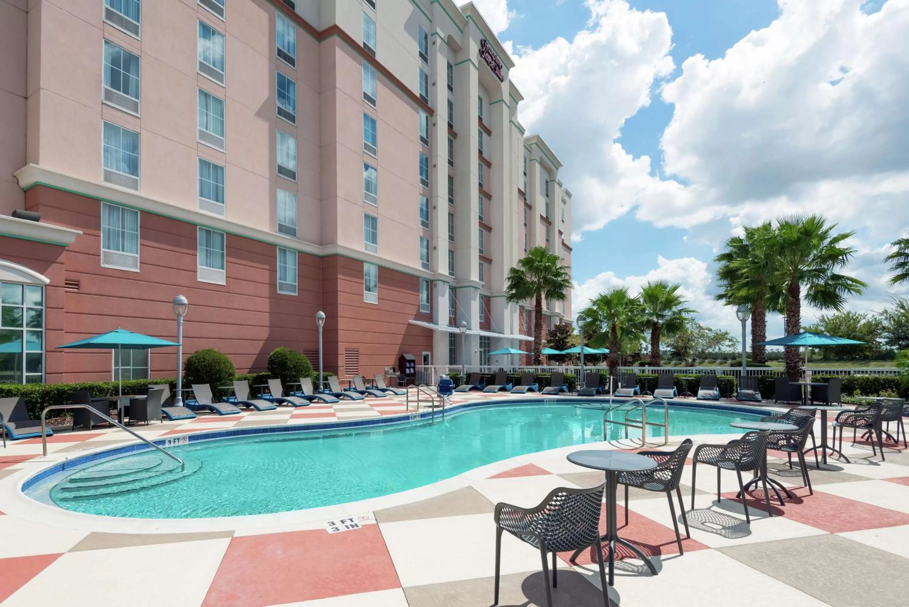Pool view in Hampton Inn & Suites Orlando Airport at Gateway Village