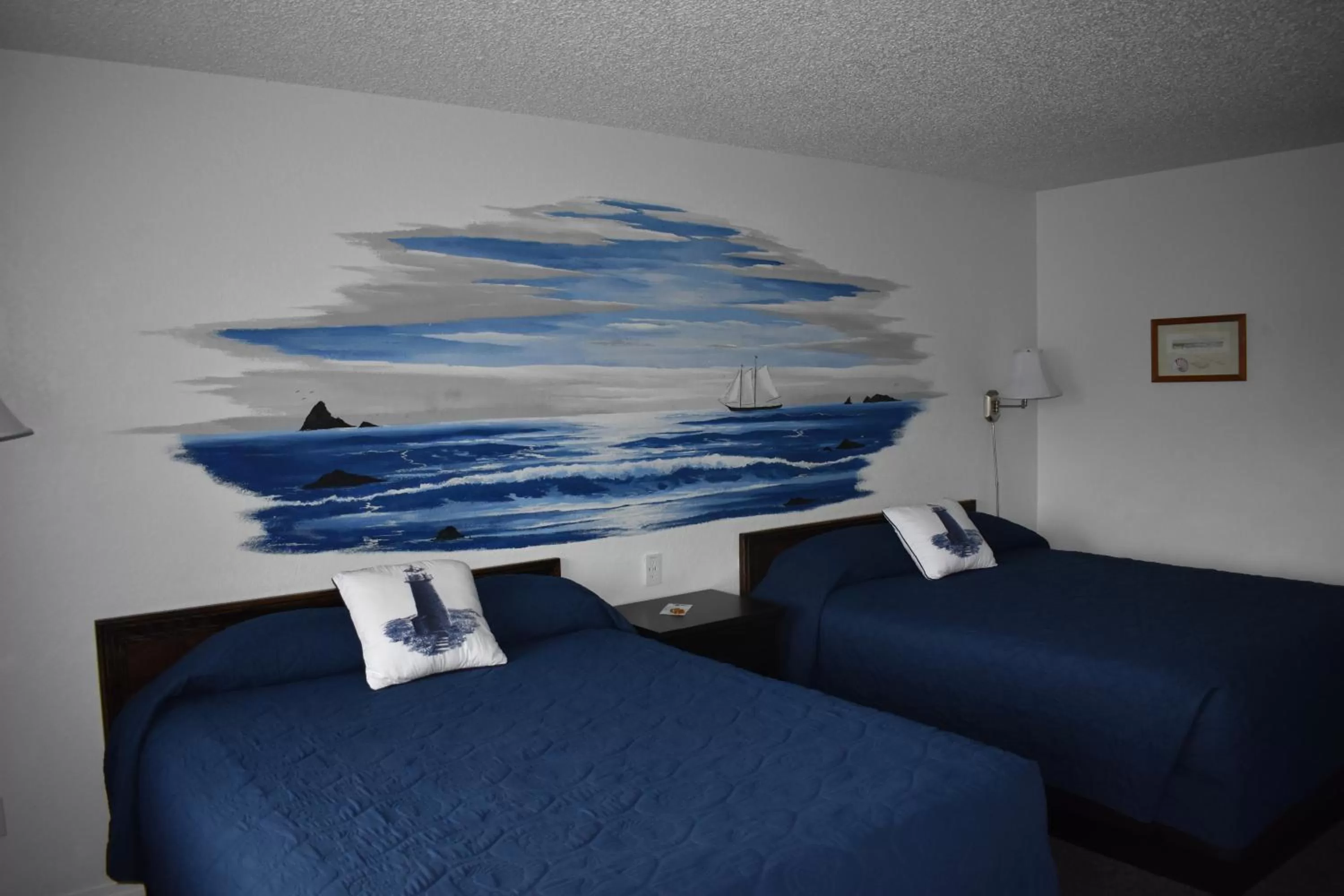 Bed in Lighthouse Cove Inn