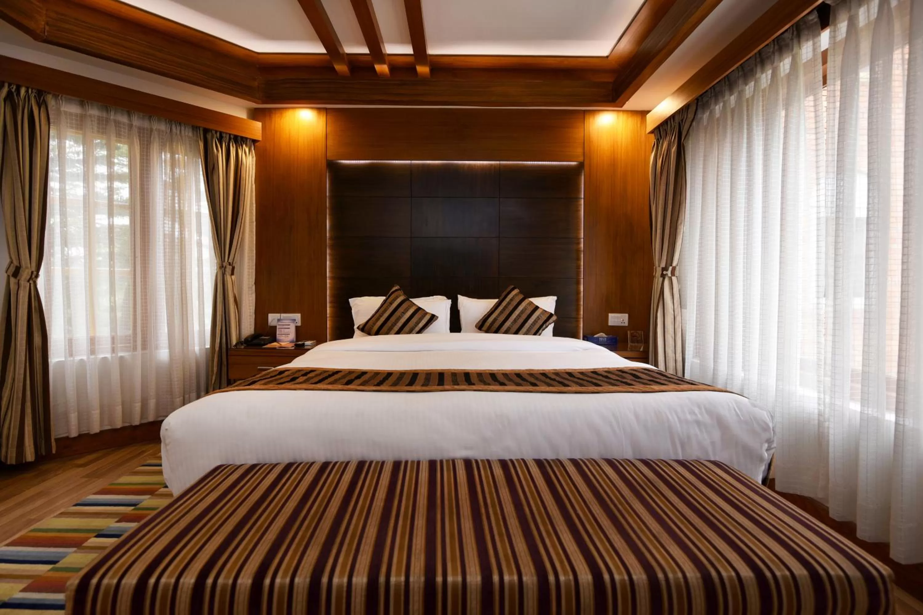 Bedroom, Bed in Park Village Resort by KGH Group