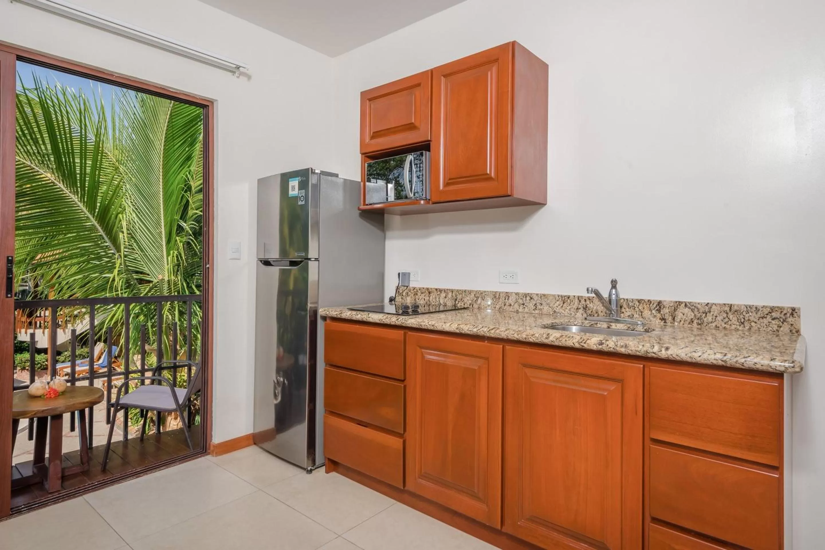 Kitchen or kitchenette in The Coast Beachfront Hotel