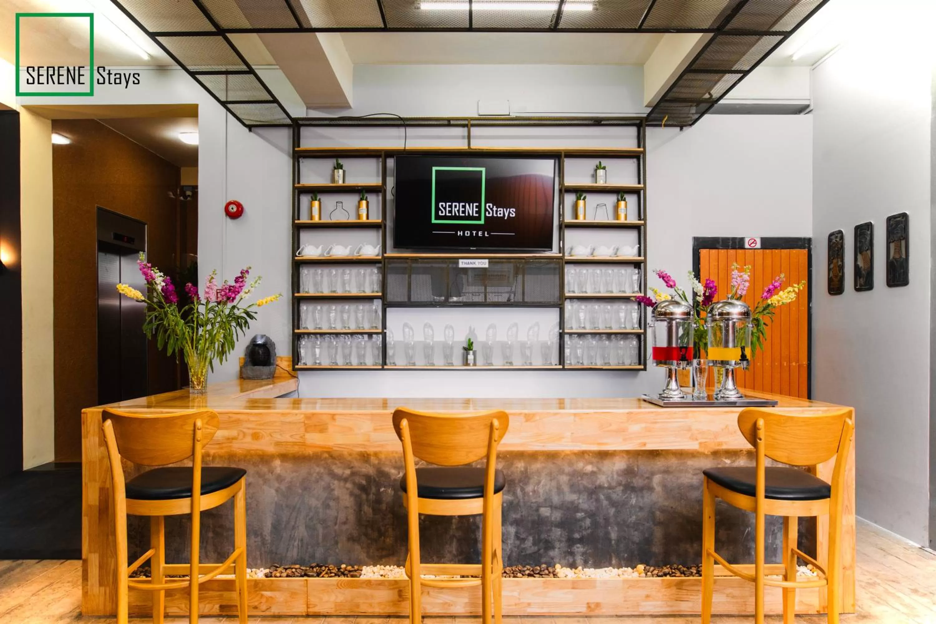 Lounge or bar in SERENE Stays Hotel