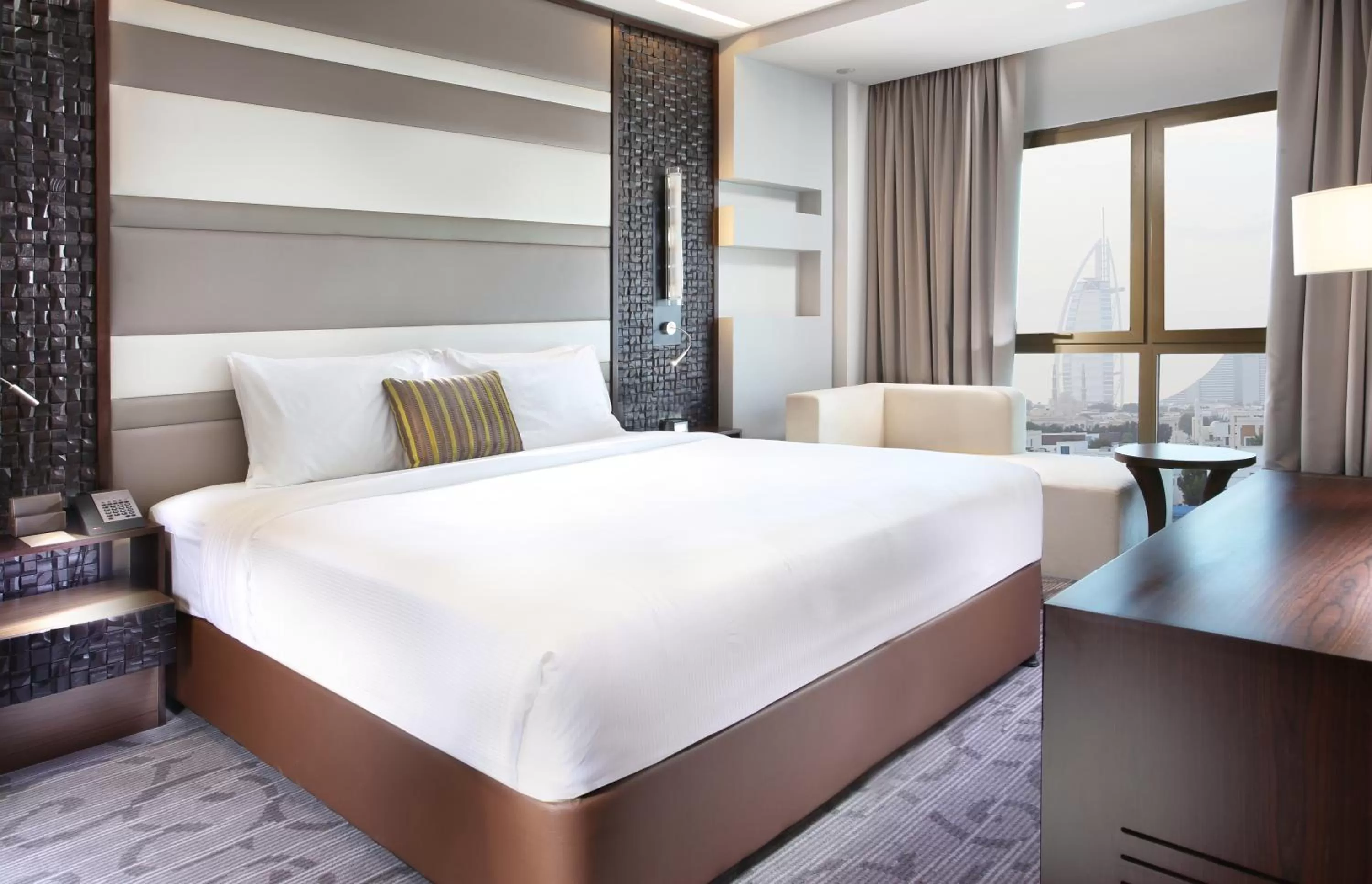 Bed in Metropolitan Hotel Dubai