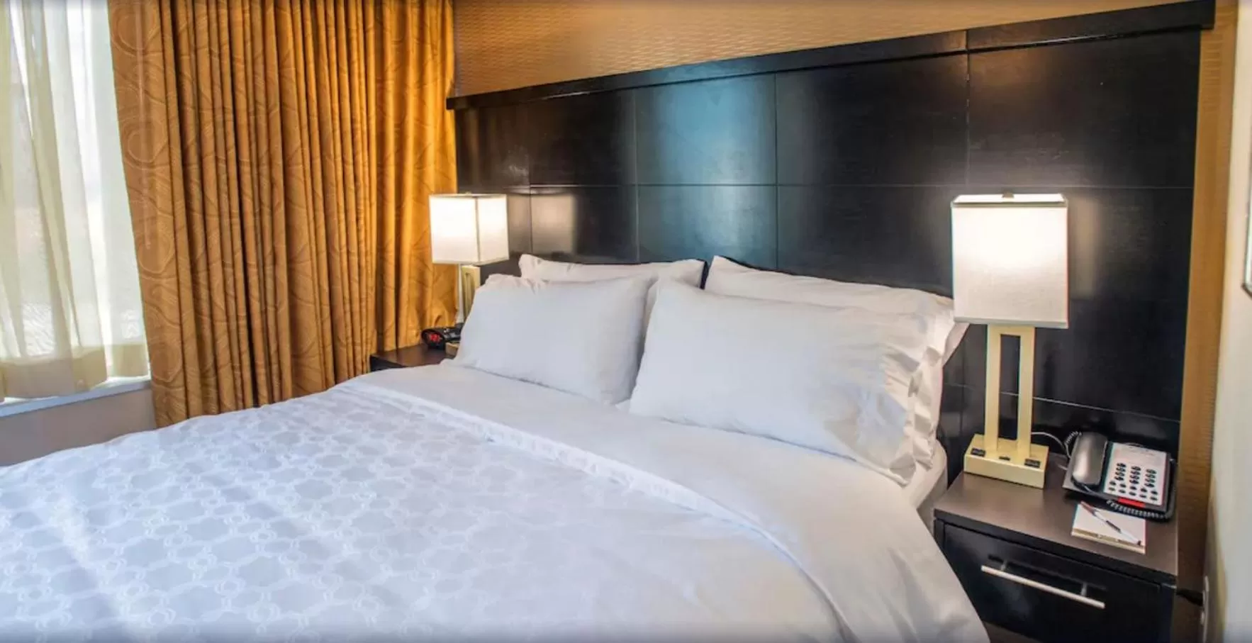 Bed in Staybridge Suites Denver Downtown by IHG