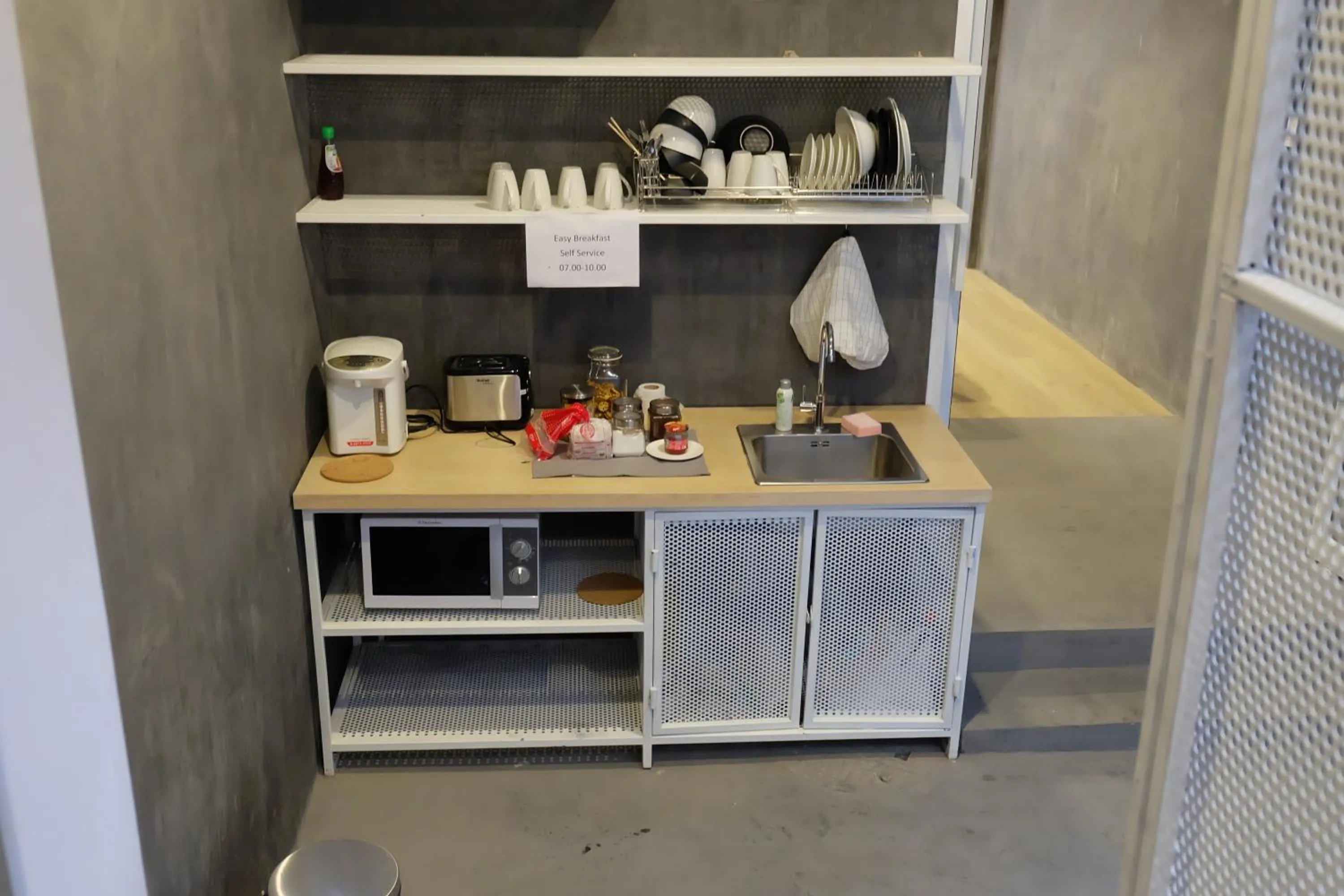 Communal kitchen in On the Bed Hostel