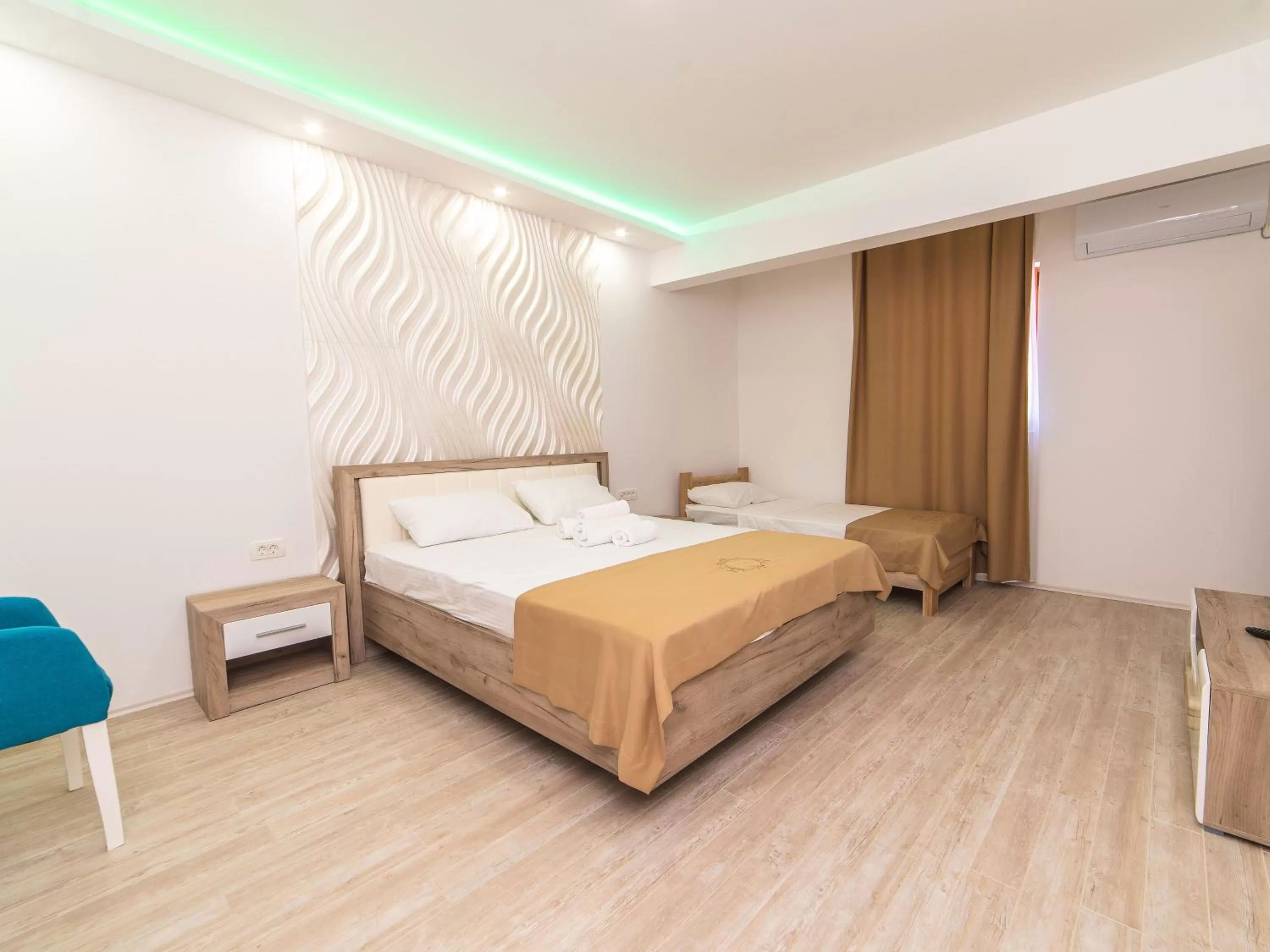 Bed in Hotel Royal Garden