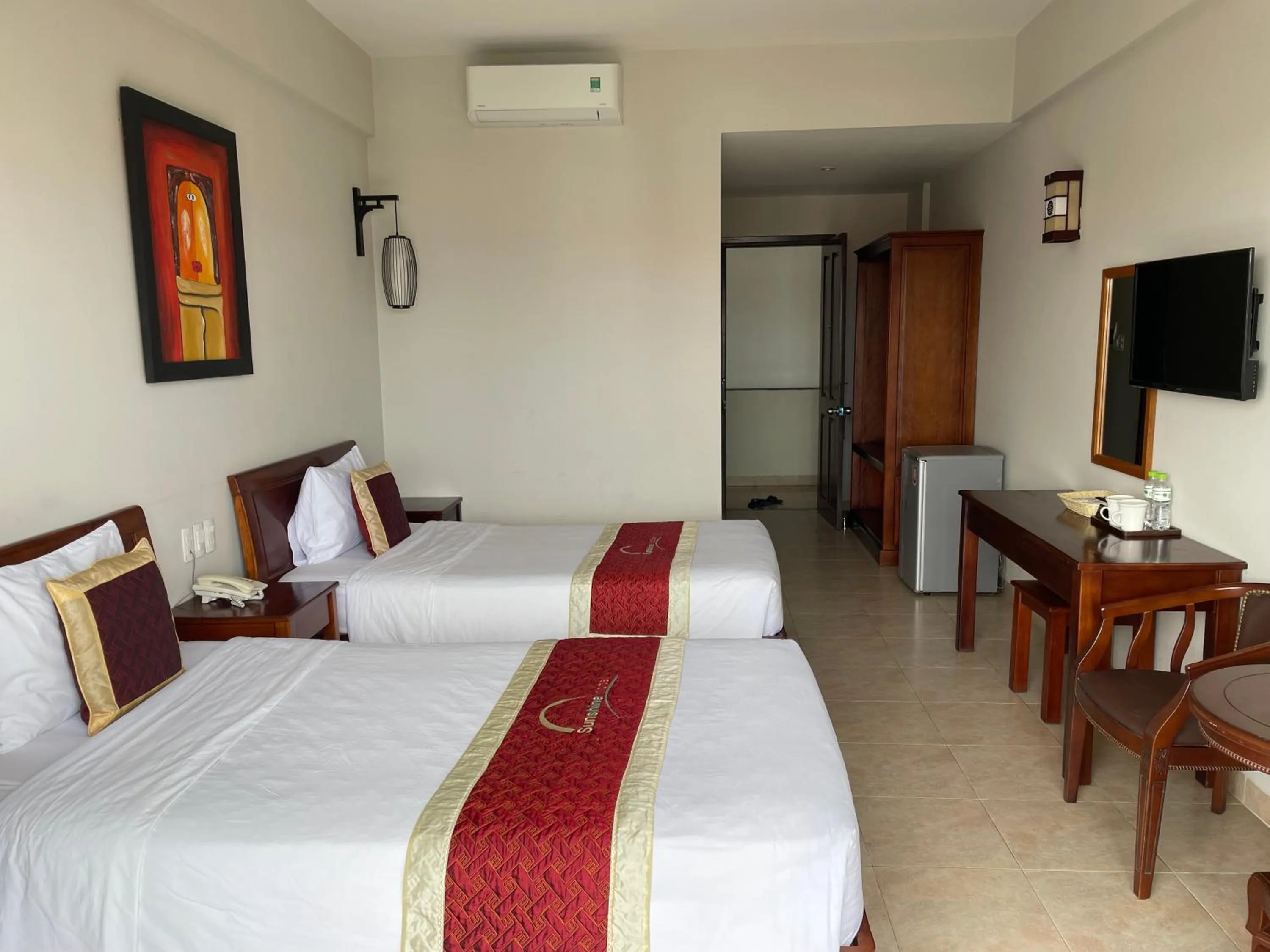 Bed in Sunshine Hoian Hotel