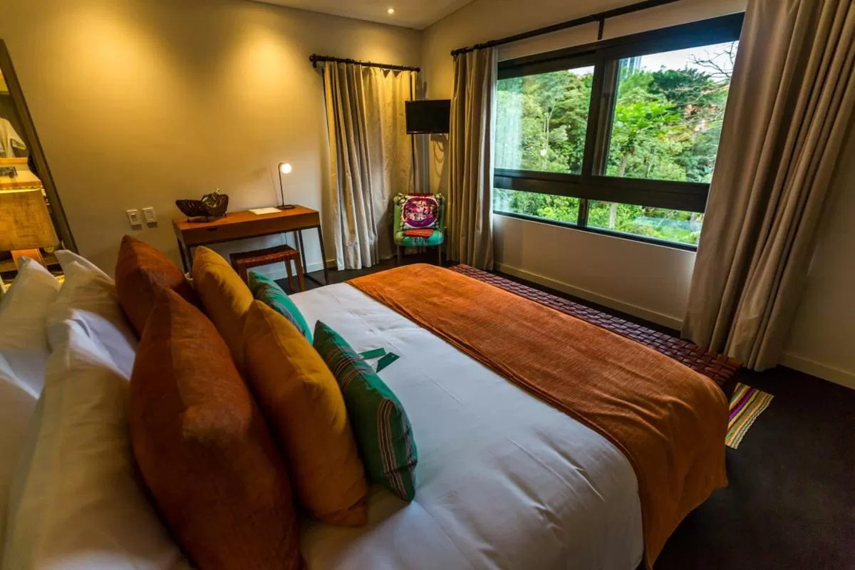 Photo of the whole room, Bed in Patio del Mundo