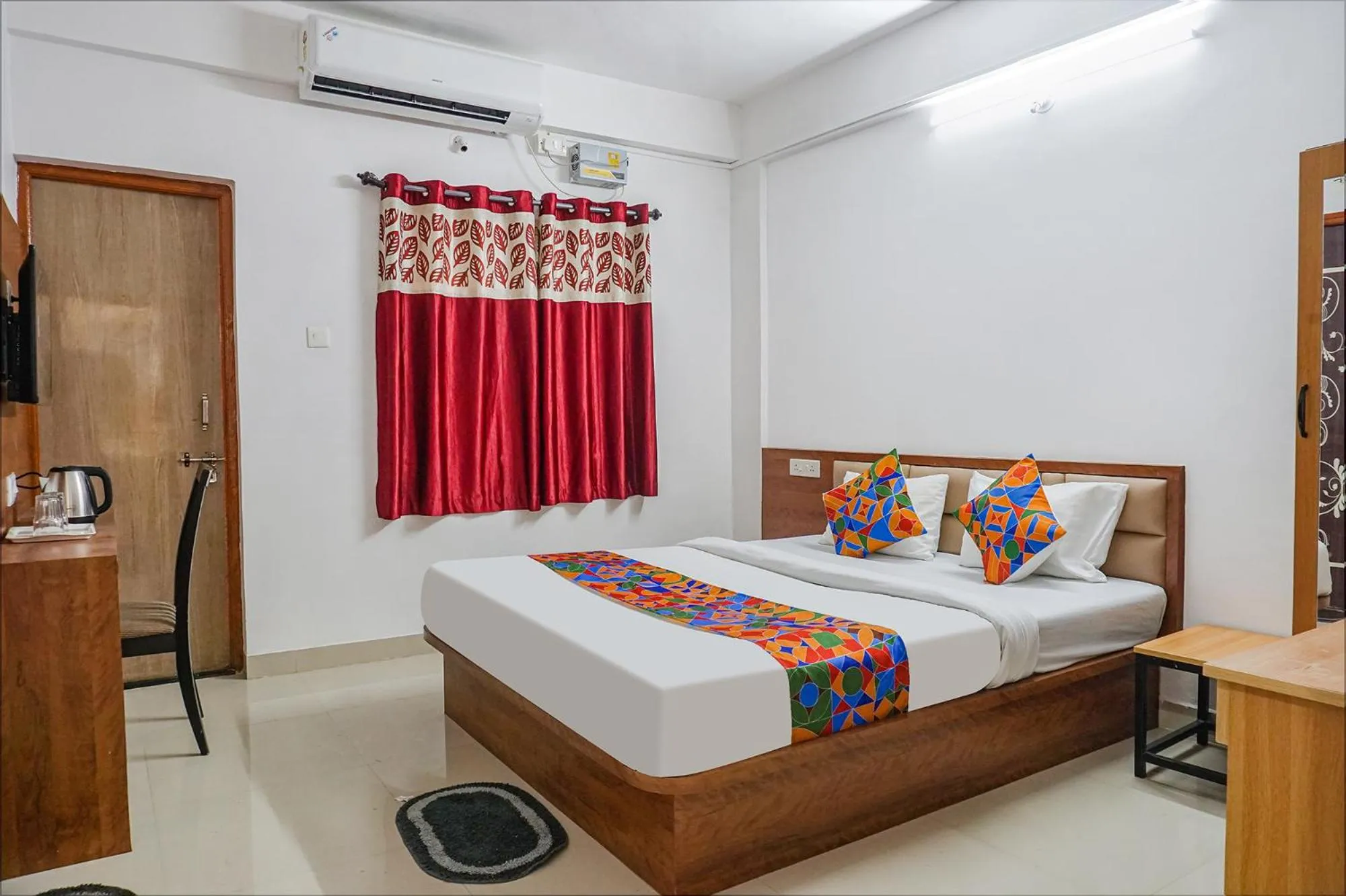 Bed in FabHotel Lake View - Chinmaya Vitthal Mandir