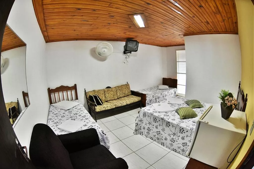 Living room in Pousada Alvorada Brotas - e agendamento das atividades turísticas