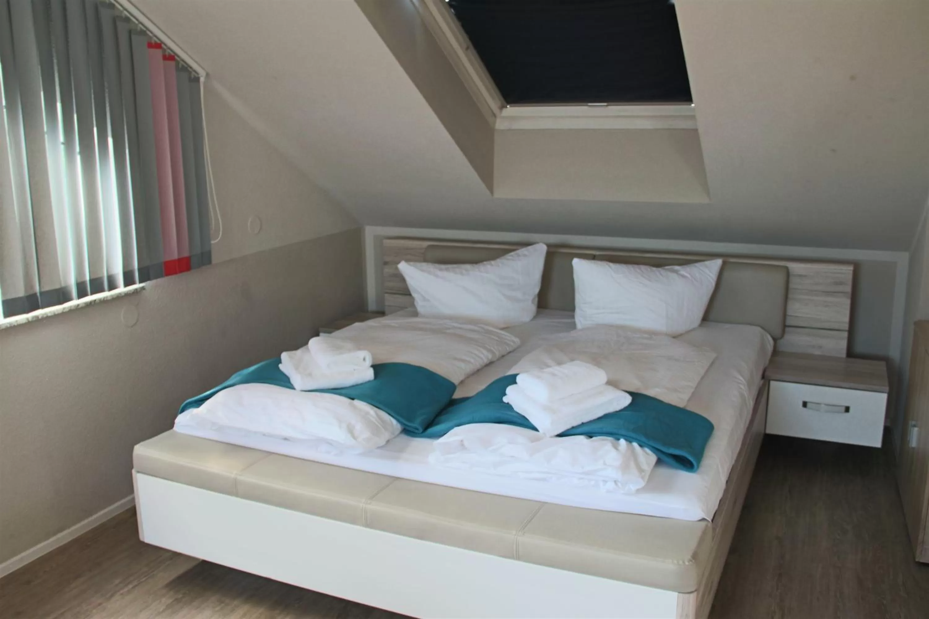 Photo of the whole room, Bed in Check Inn Hotel Merseburg