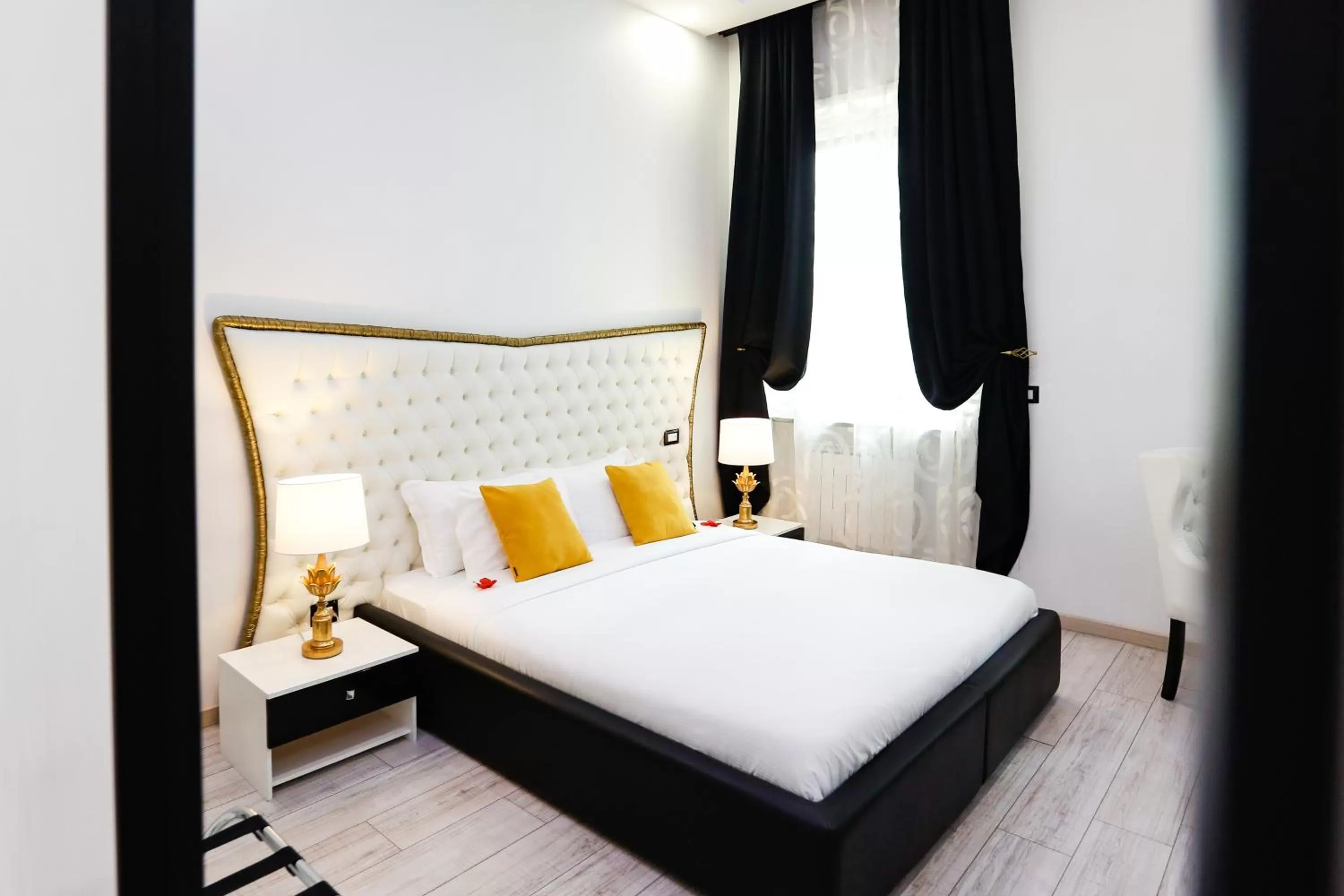 Bed in Escape Luxury Suite - CA Domus Collection