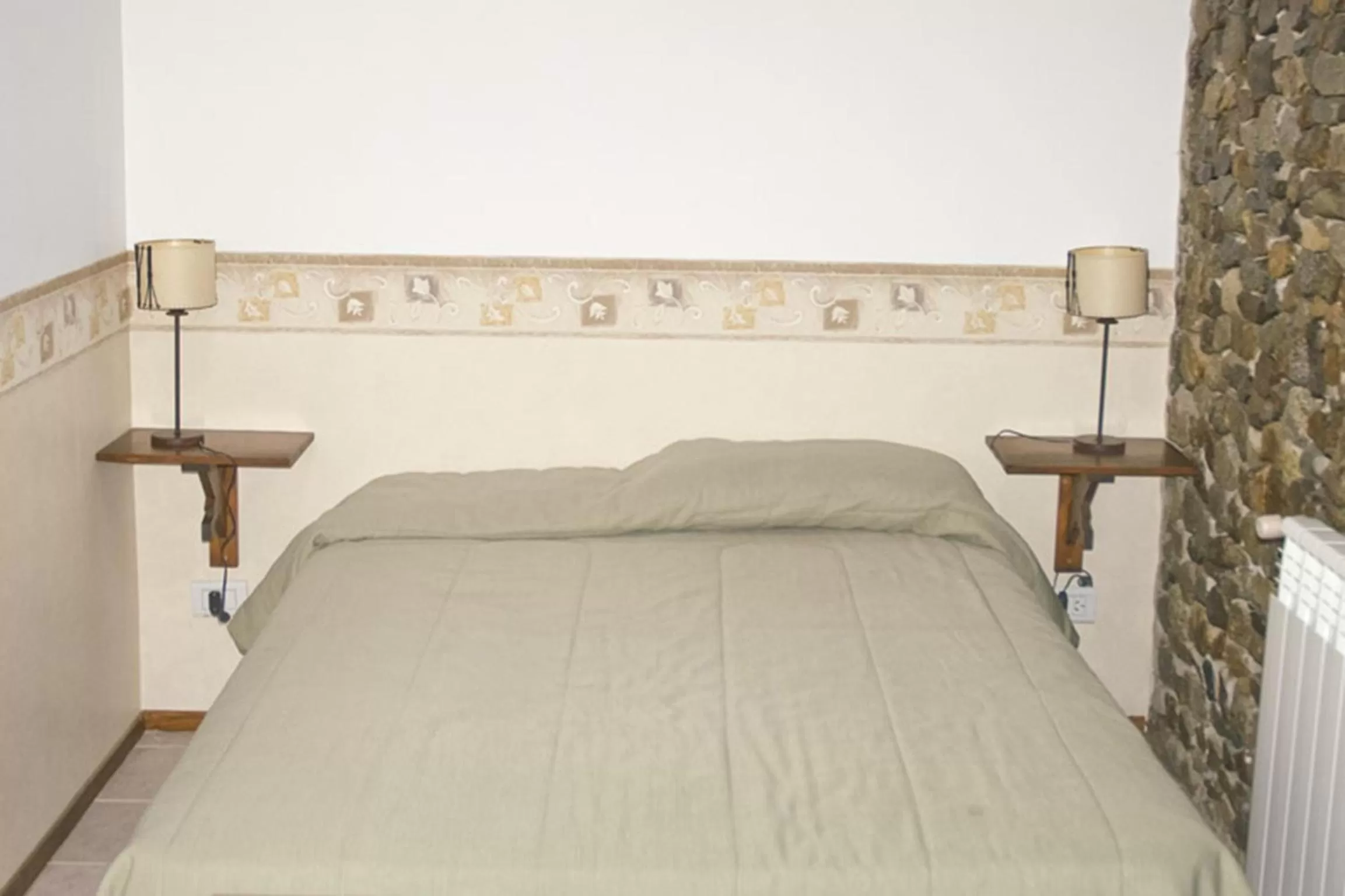 Bed in Hosteria Sloggett