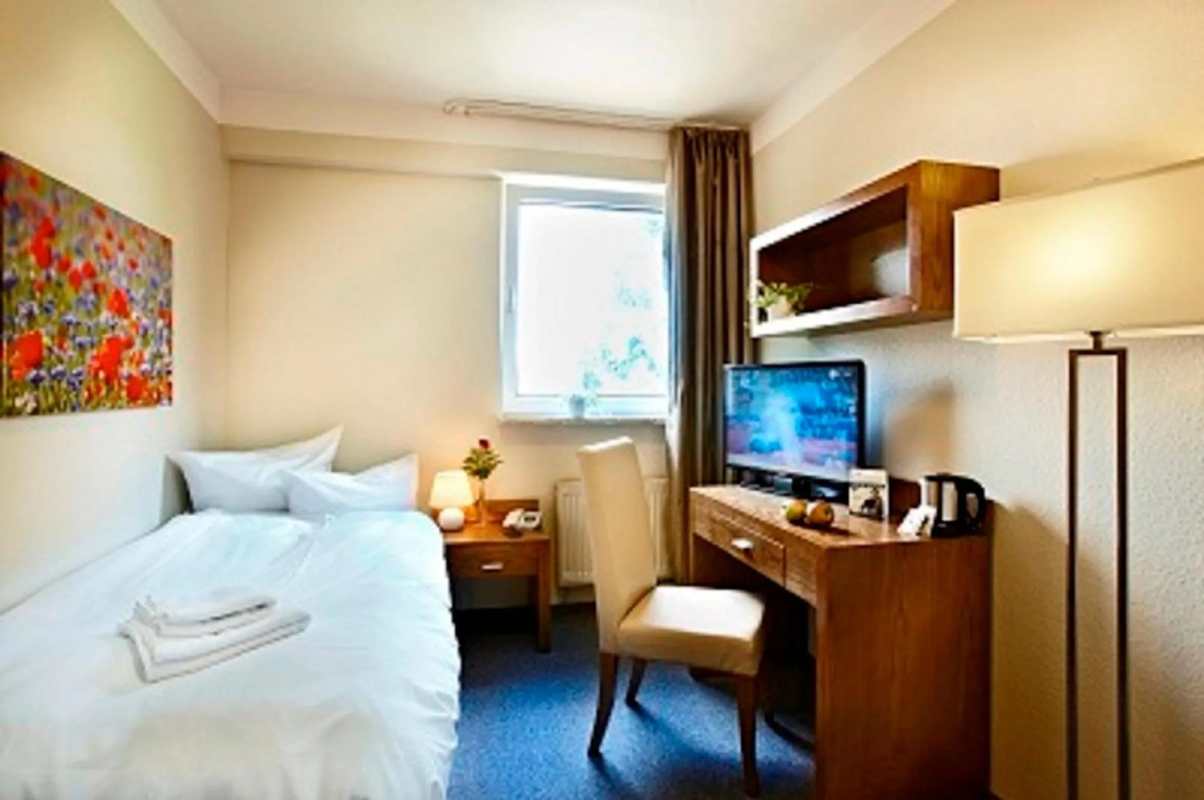 Bed in Hotel Königstein Kiel by Tulip Inn