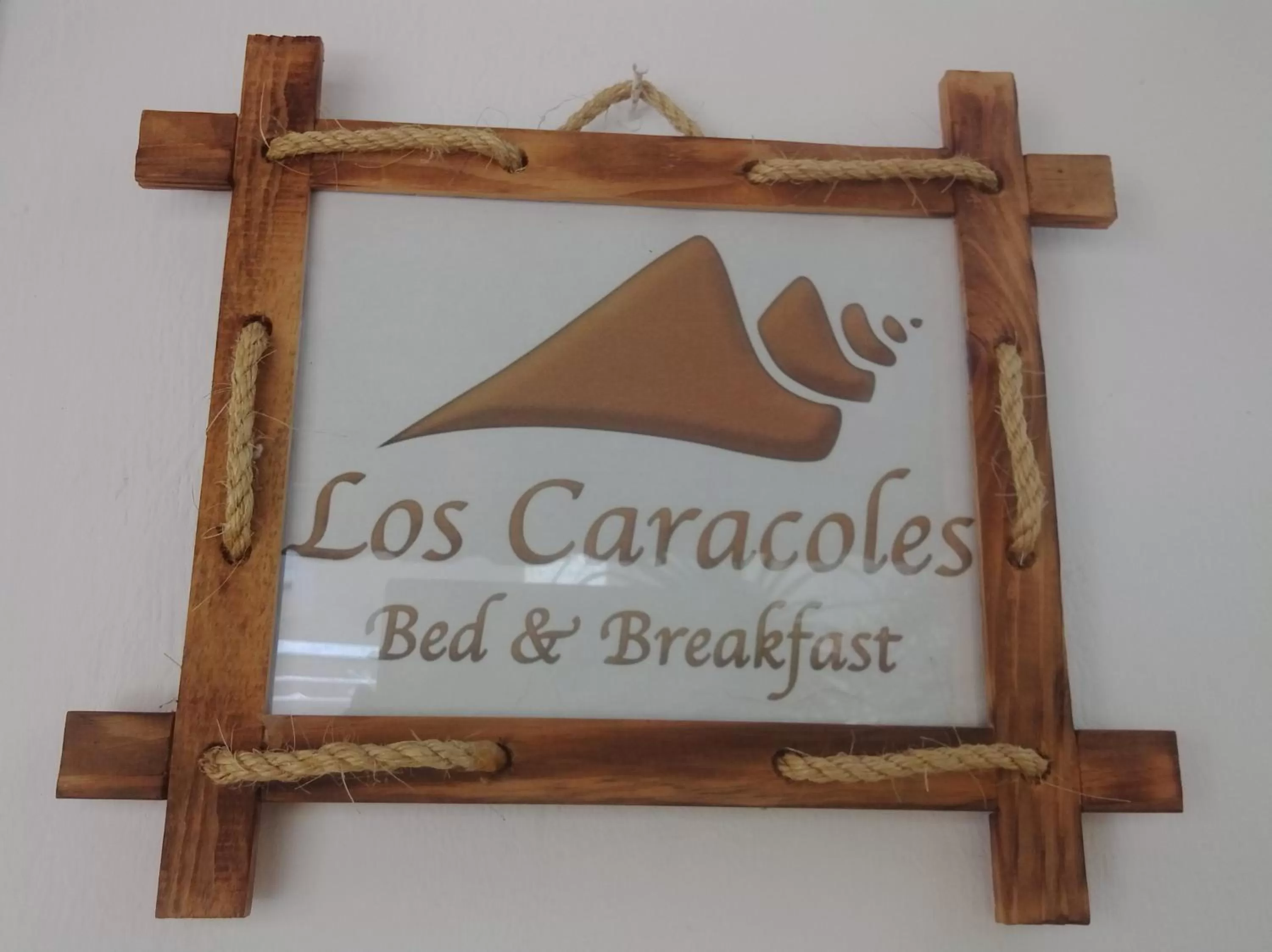 Property logo or sign in Los Caracoles Bed & Breakfast