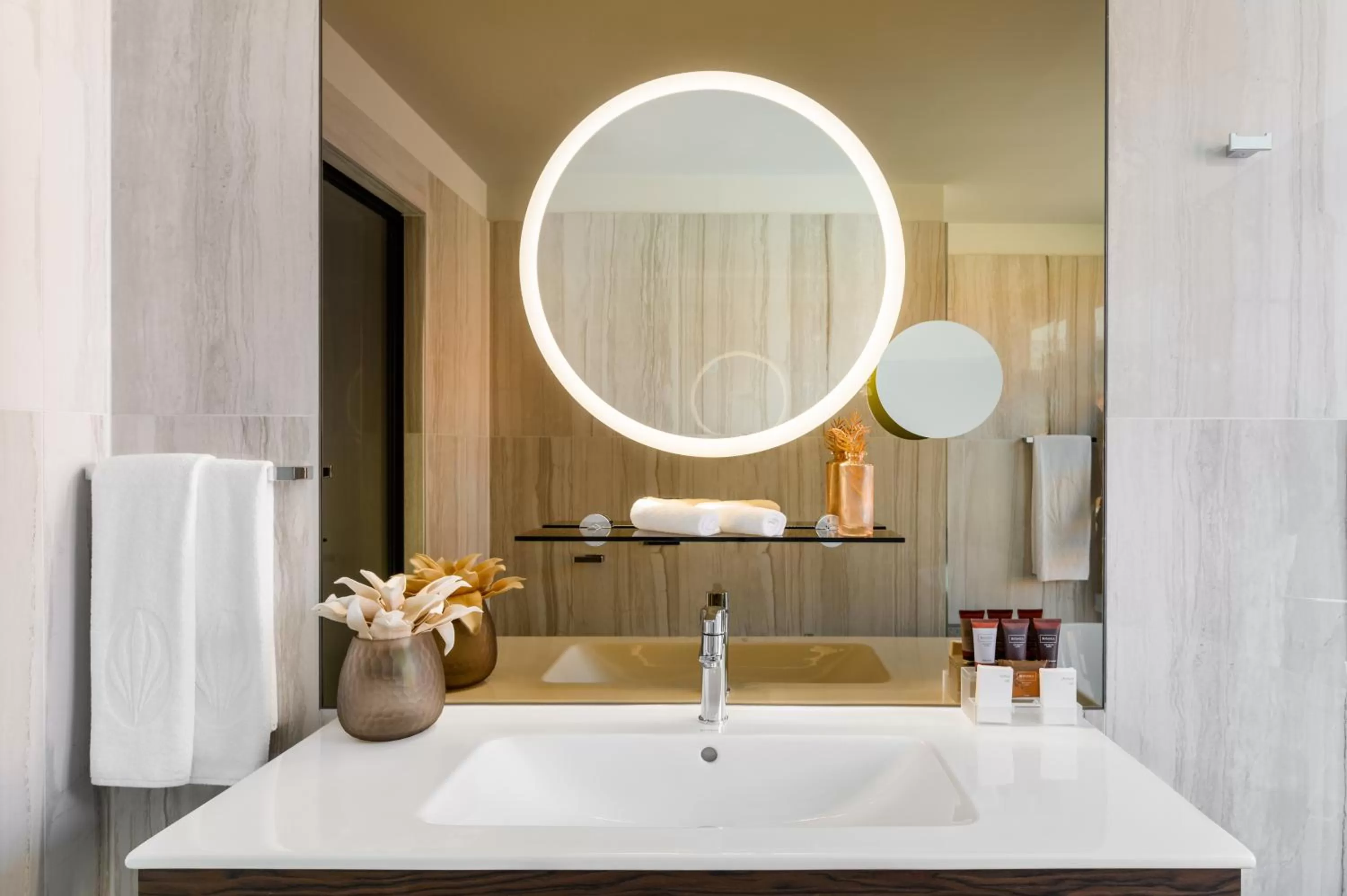 Bathroom in Emerald Downtown Luxury Suites by Continental Group