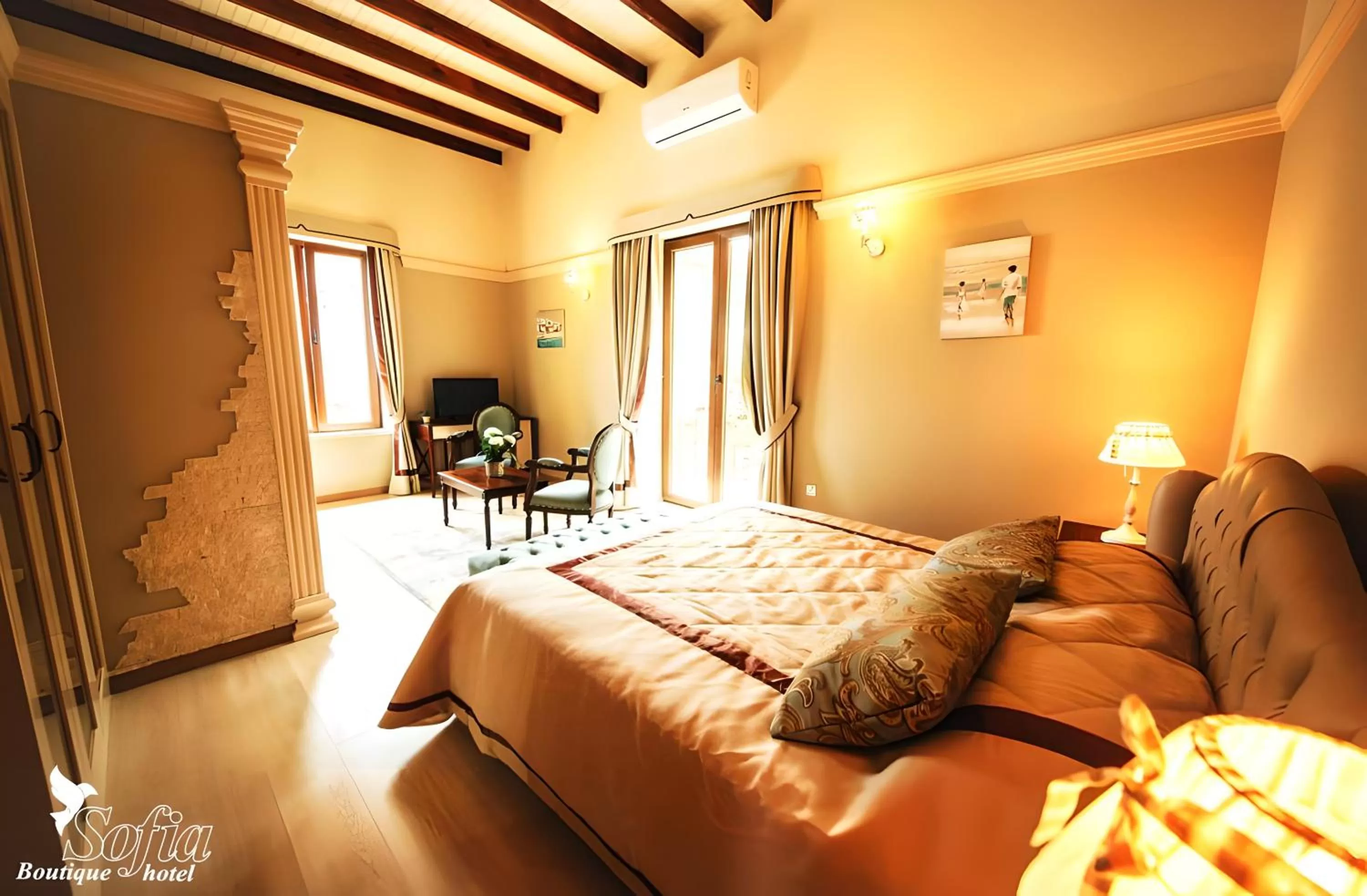 Bed in SOFIA BOUTIQUE HOTEL