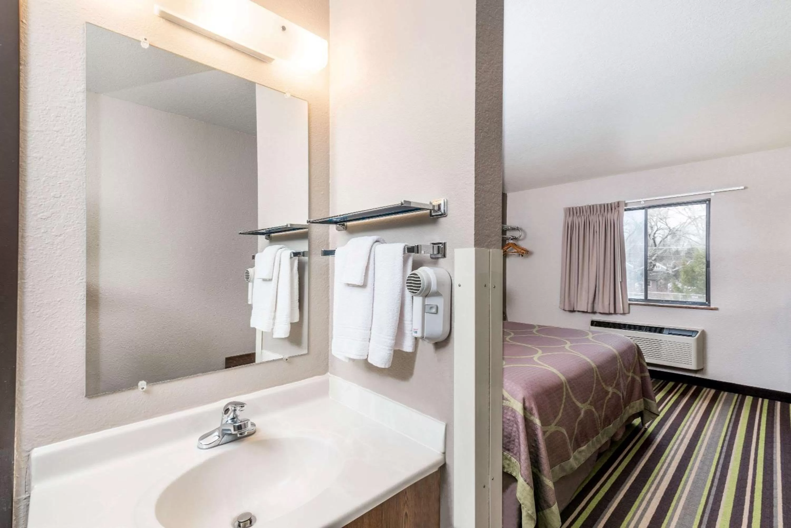 Bathroom, Bed in Super 8 by Wyndham Kalispell Glacier National Park