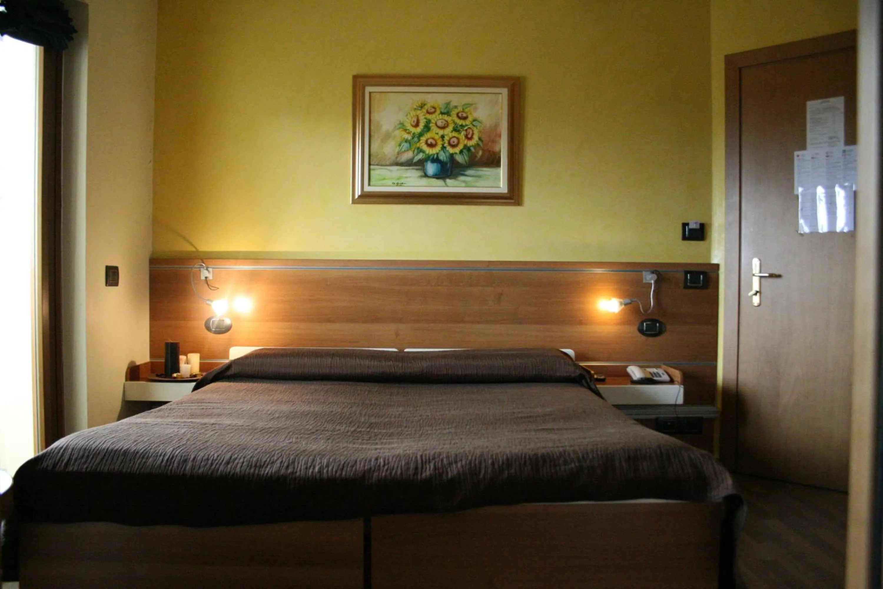 Bed in Hotel La Meridiana