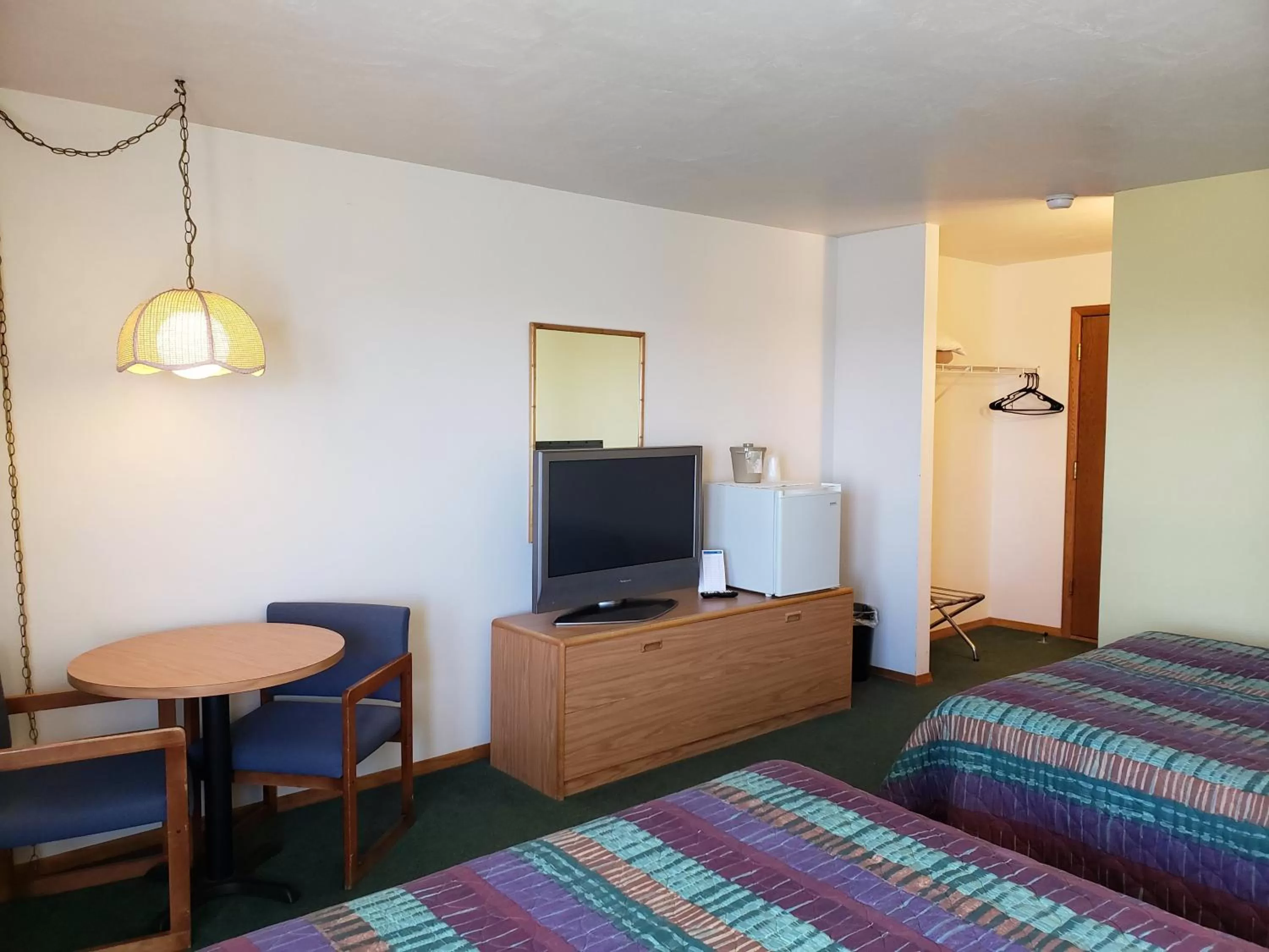 Bed in Algoma Beach Motel