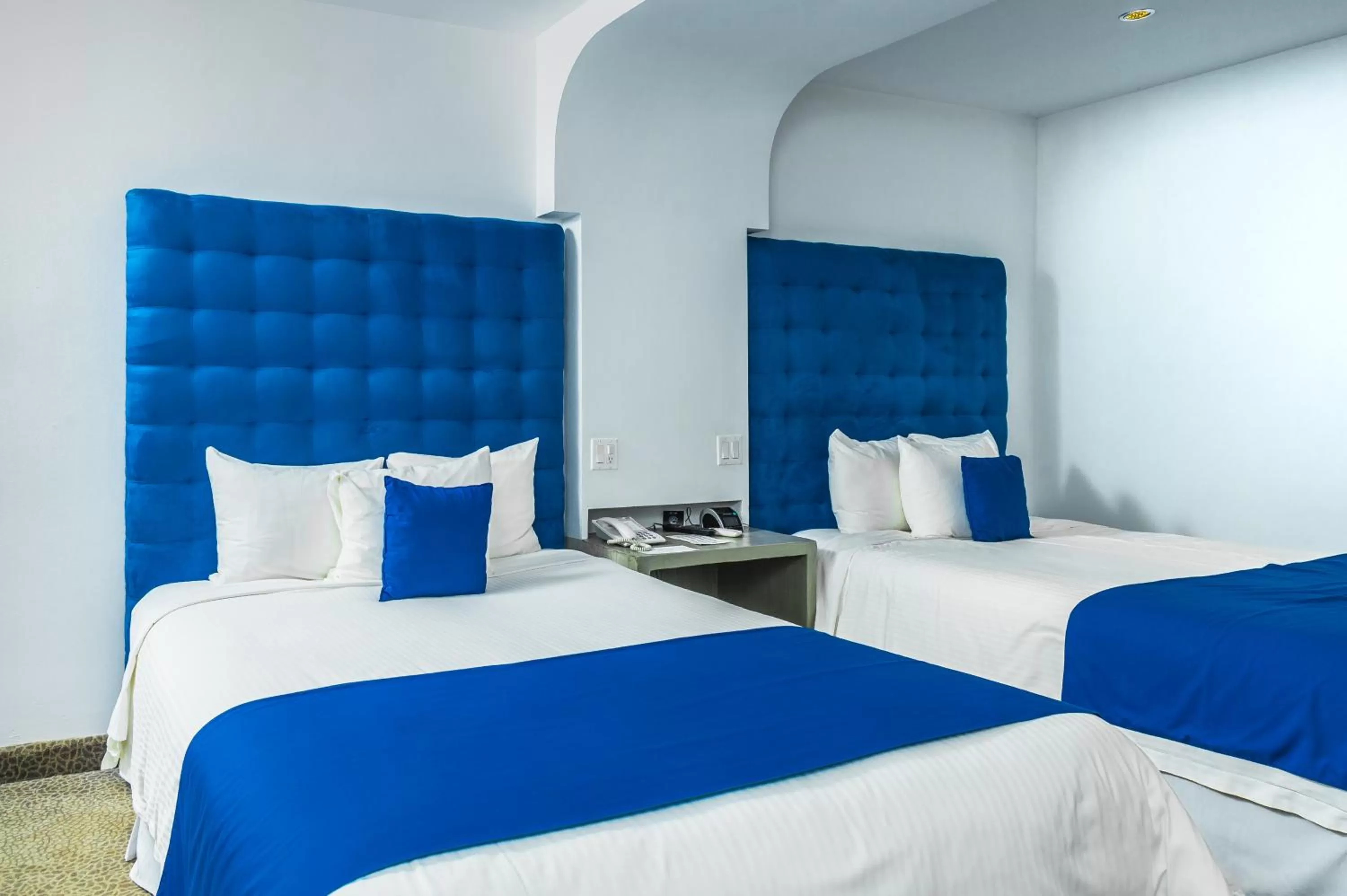 Bed in Riande Aeropuerto Hotel Casino