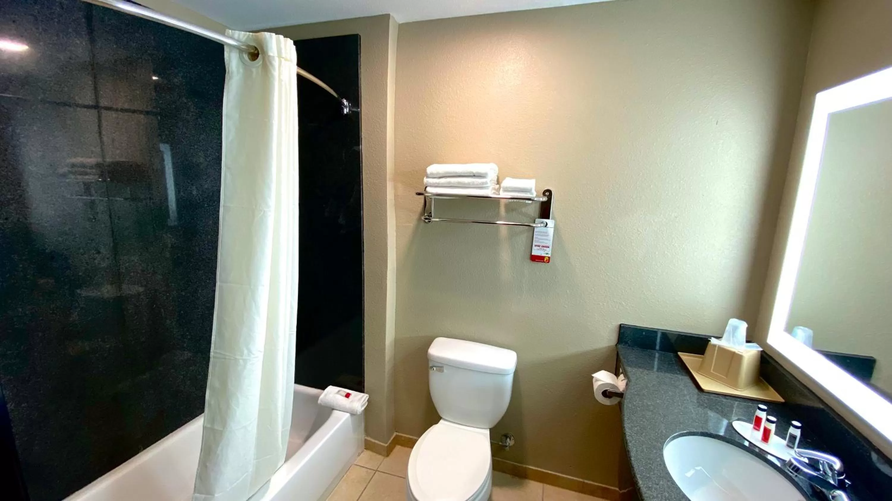 Toilet in Super 8 by Wyndham Harker Heights Killeen - Fort Cavazos