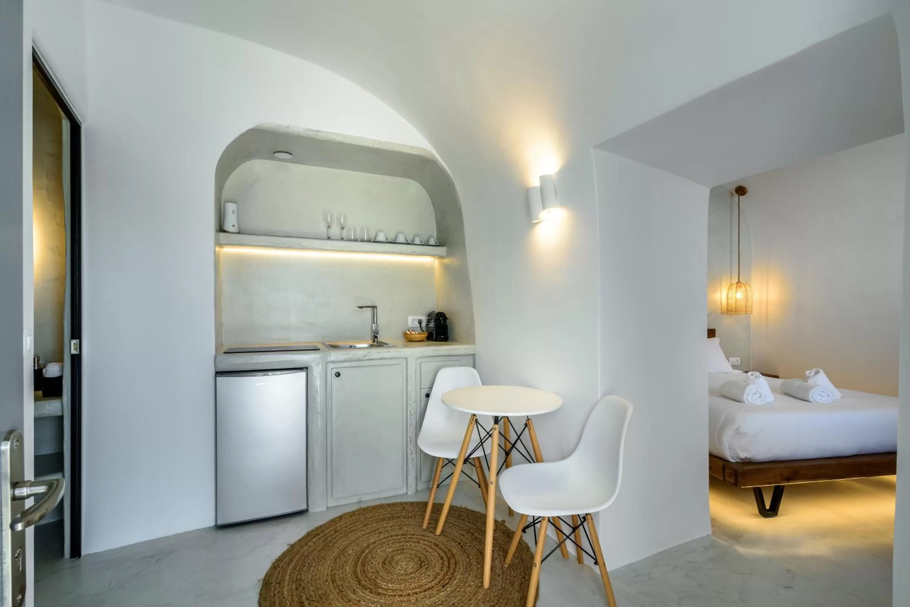 Dining area, Bed in Anila Suites