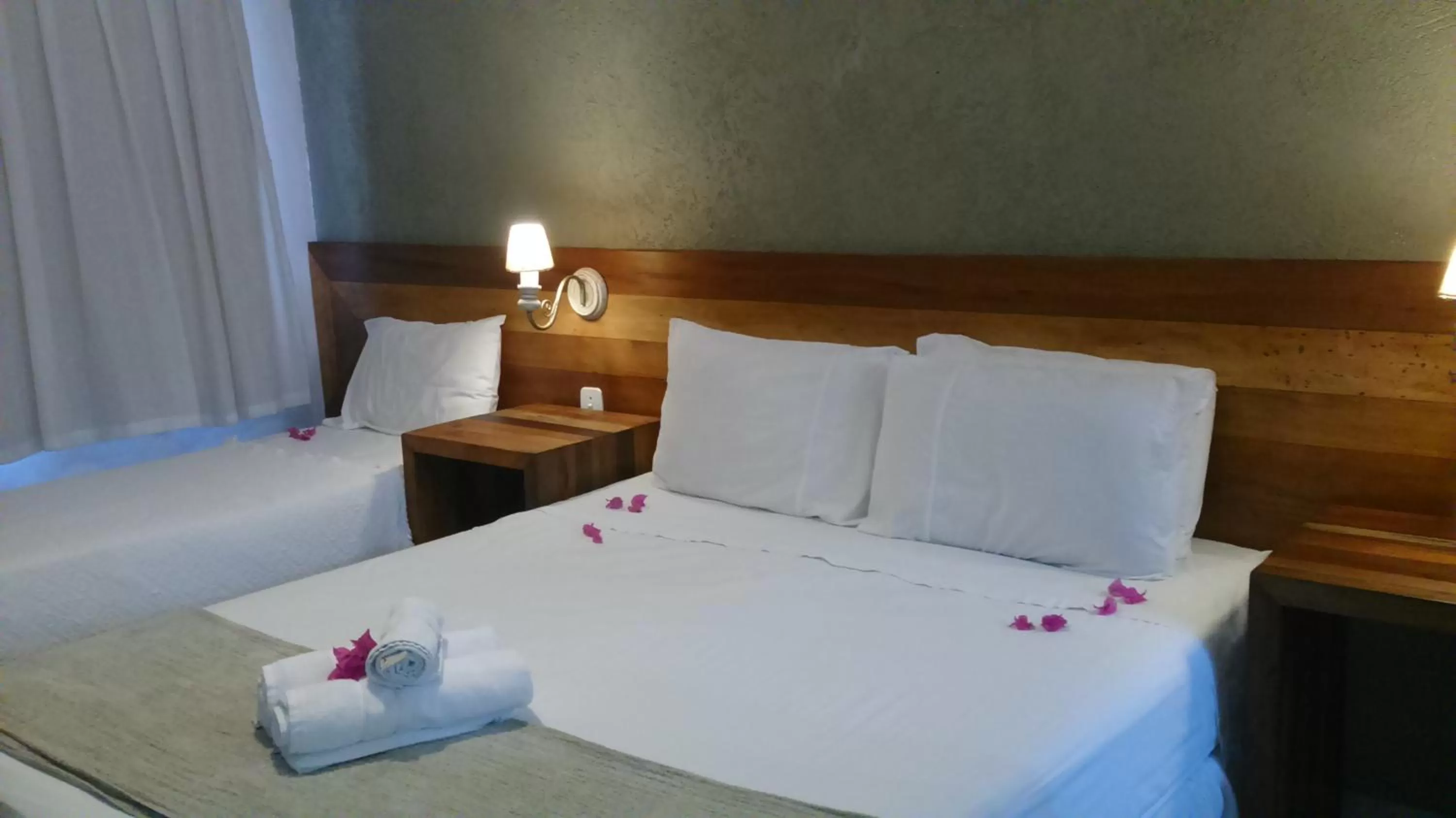 Bed in Pousada Praia João Fernandes