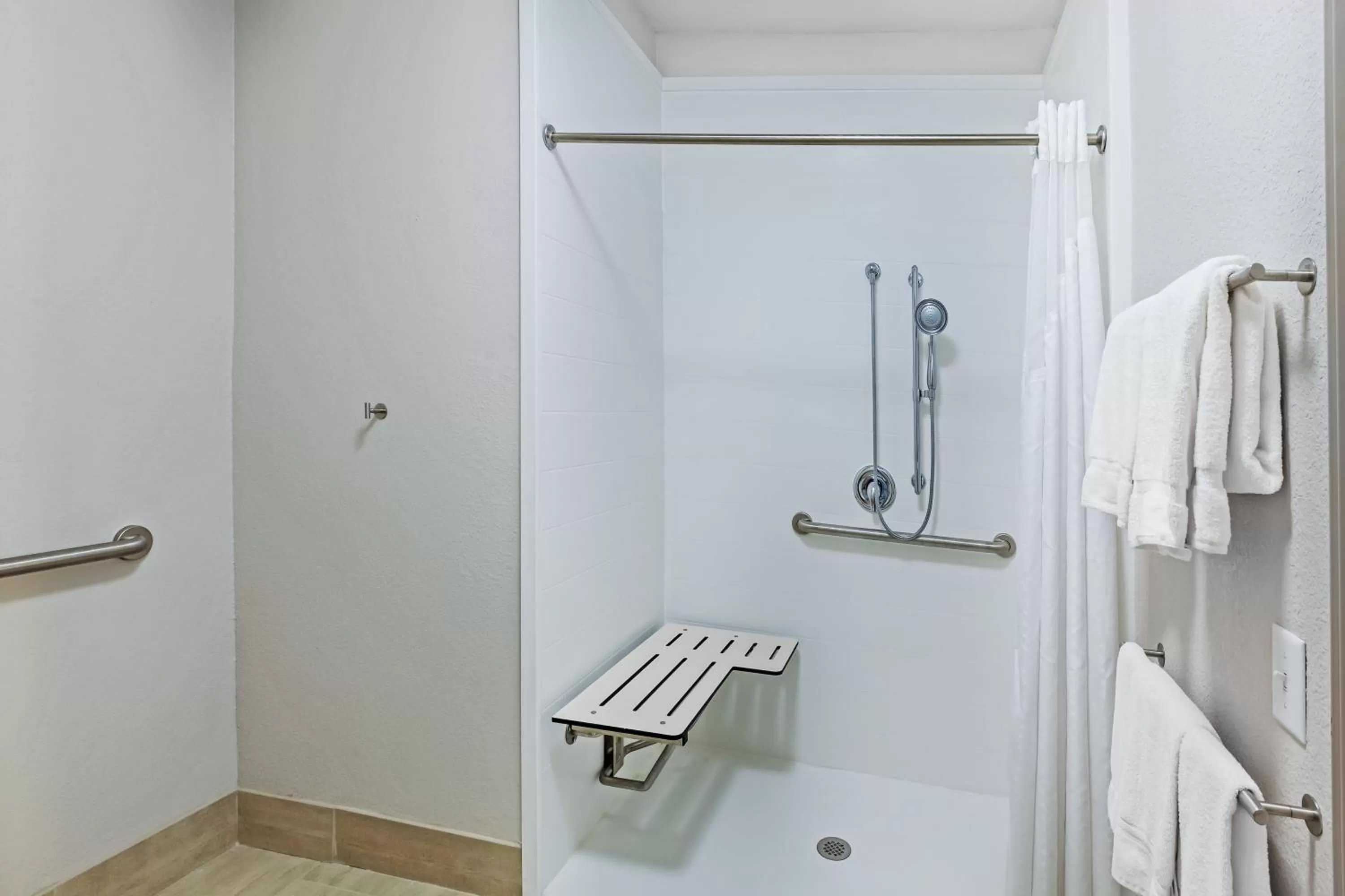 King Suite with Mobility Accessible Roll-In Shower in Holiday Inn Express Hotel & Suites Dallas Lewisville, an IHG Hotel