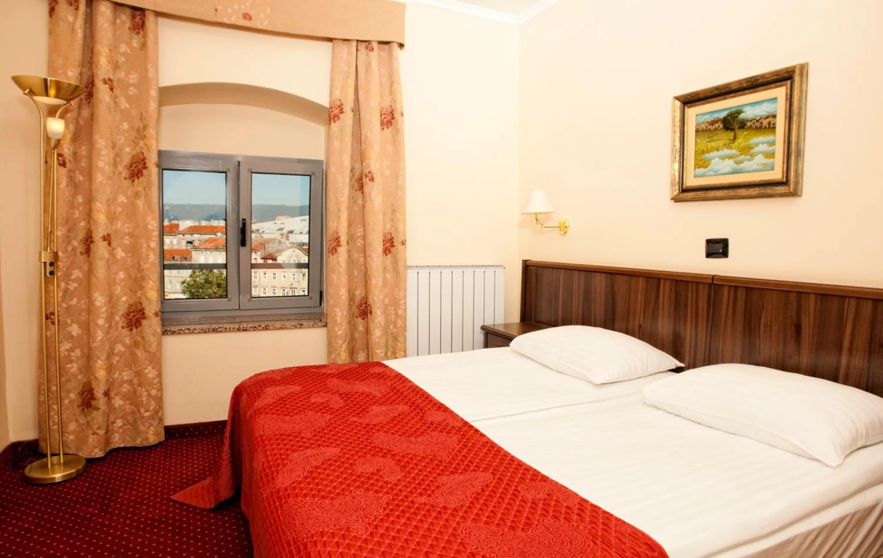 Bed in Hotel Continental