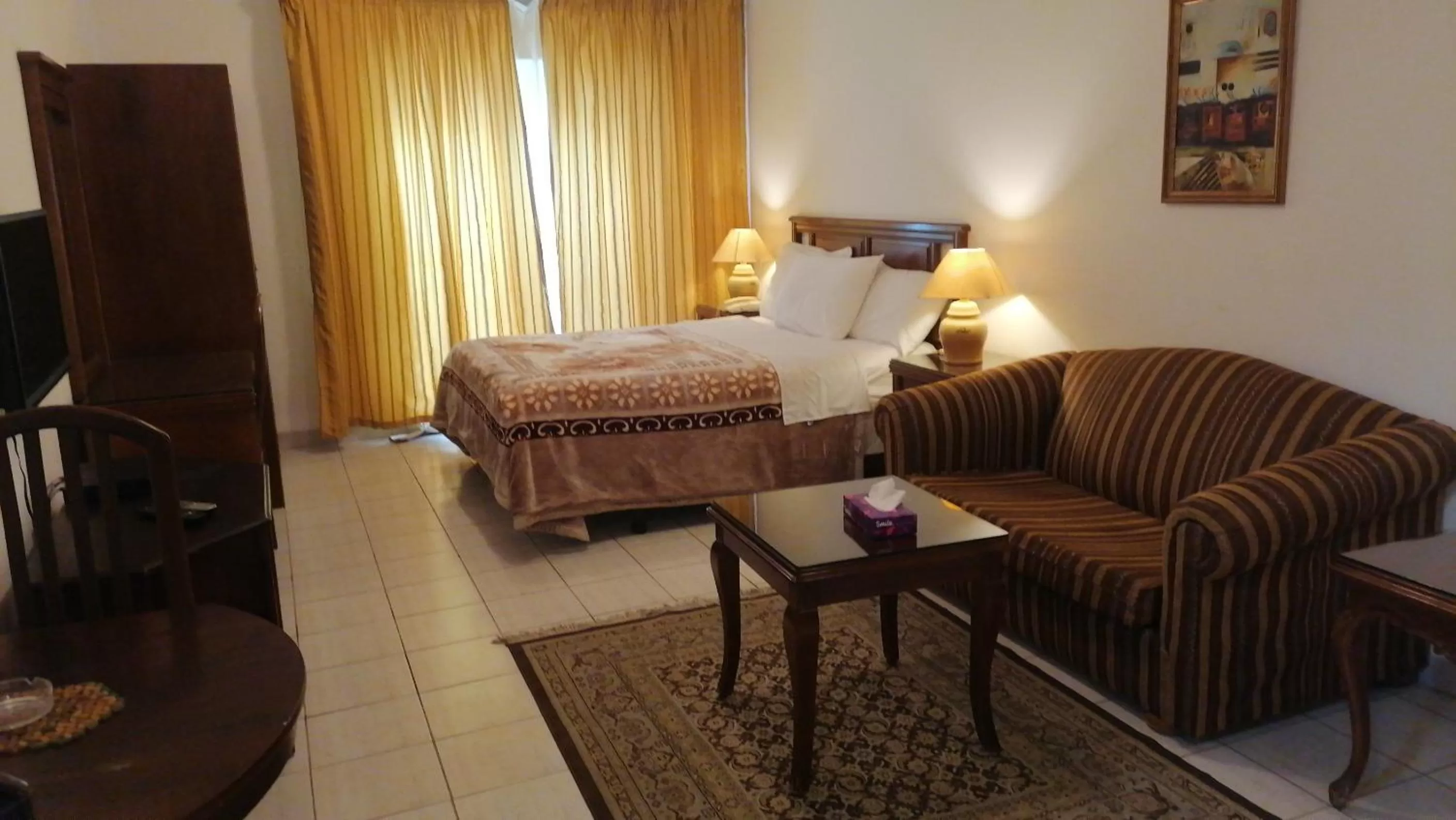 Deluxe Family Room in Delmon Suites