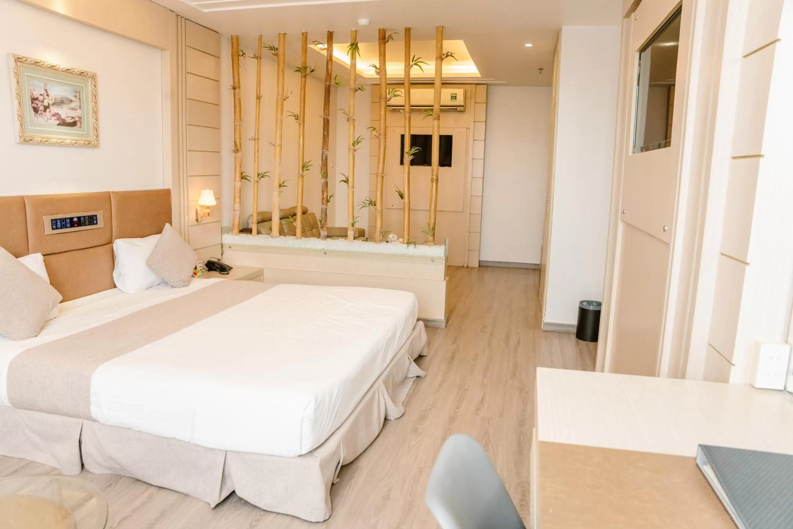 Bed in Holiday One Can Tho Hotel