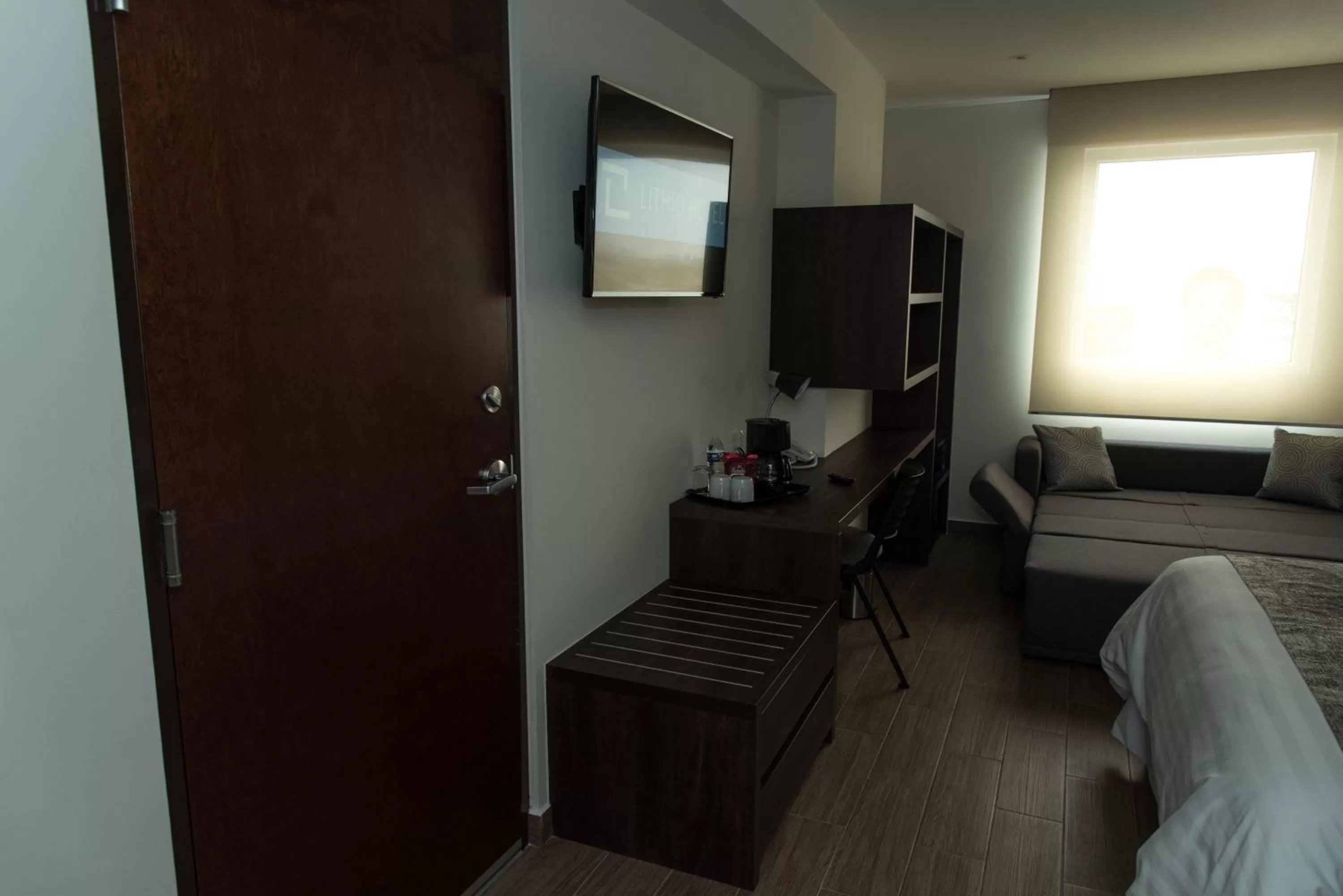 TV and multimedia, Bed in Lithio Hotel