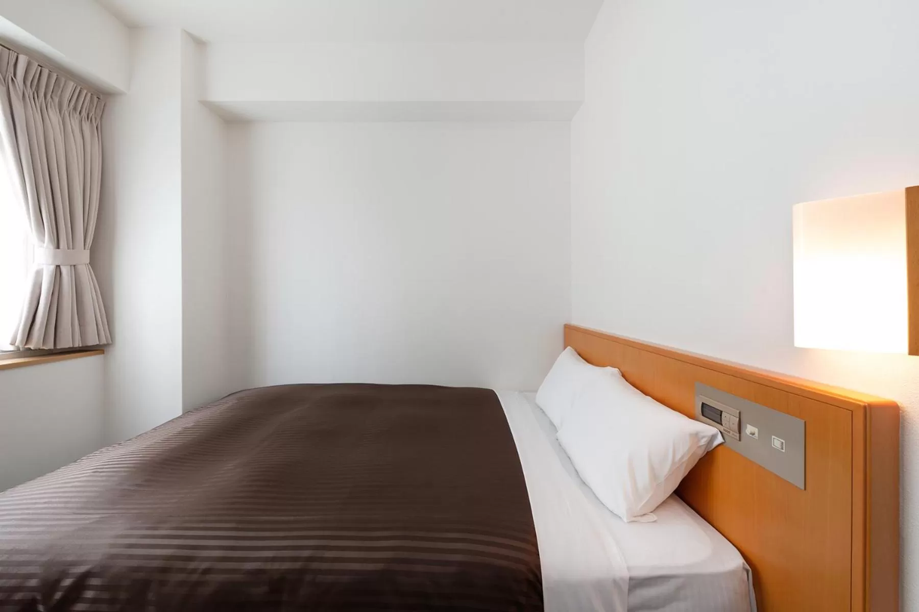 Bed in The OneFive Osaka Sakaisuji