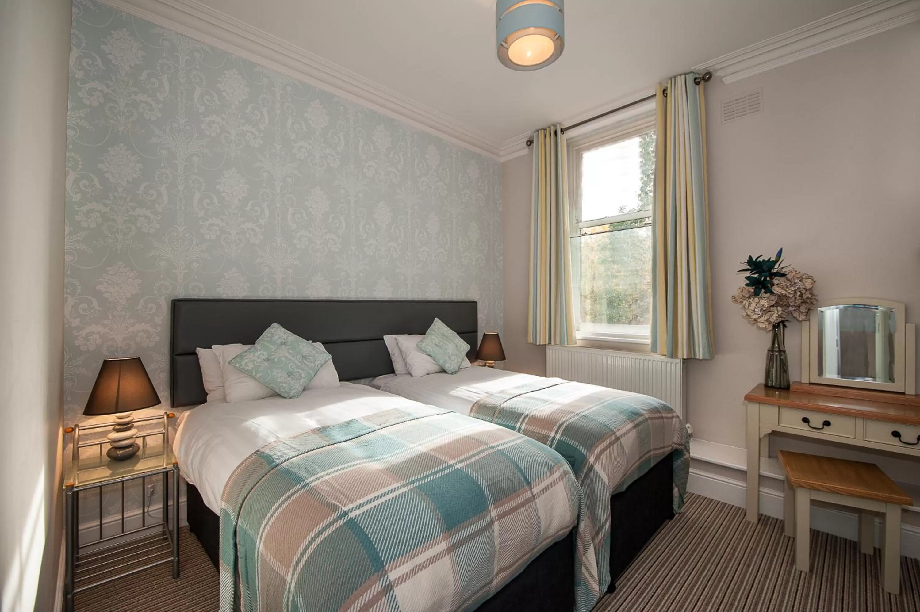 Bed in The Royal Hotel and Bar