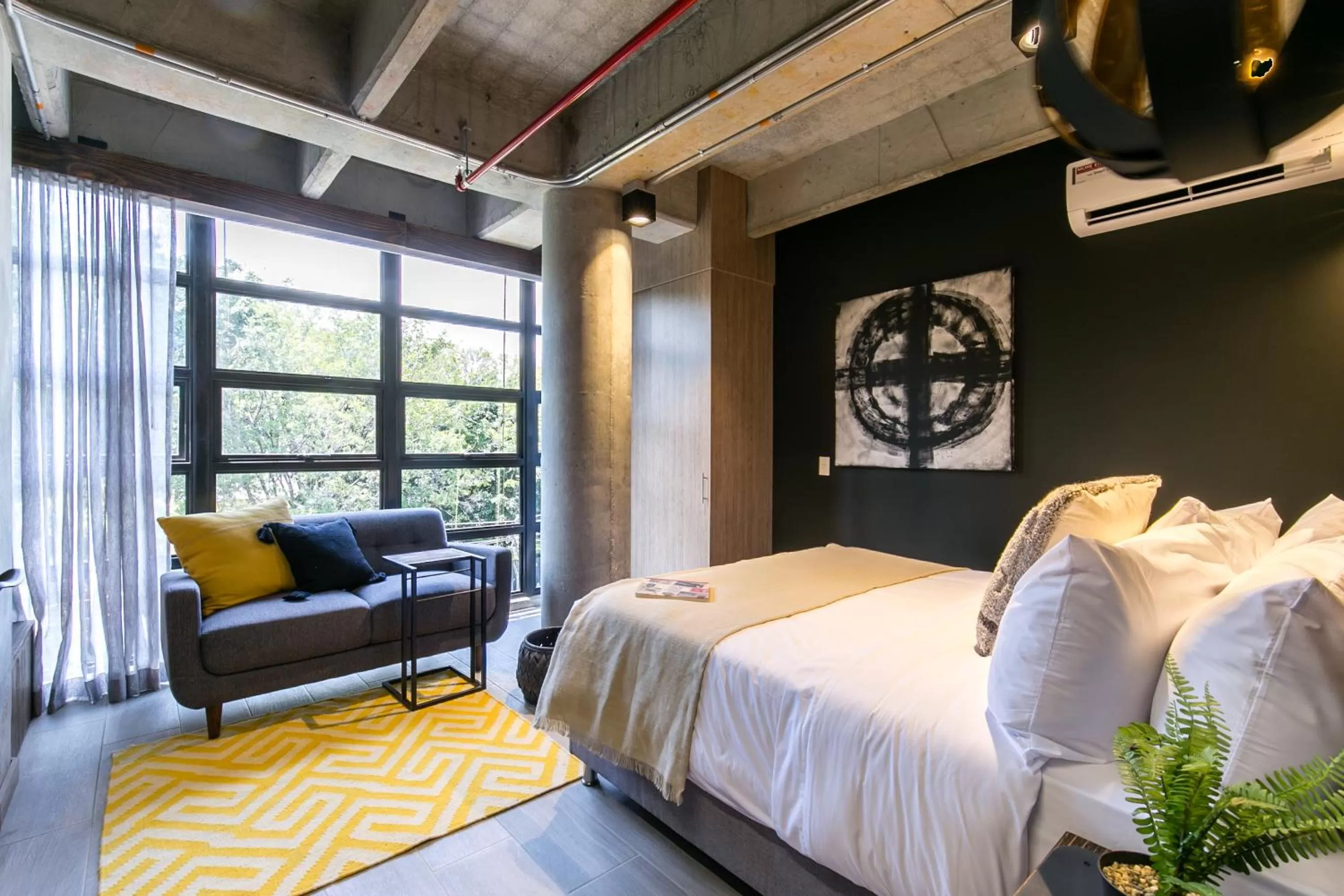 Bed in Factory Lofts Hotel