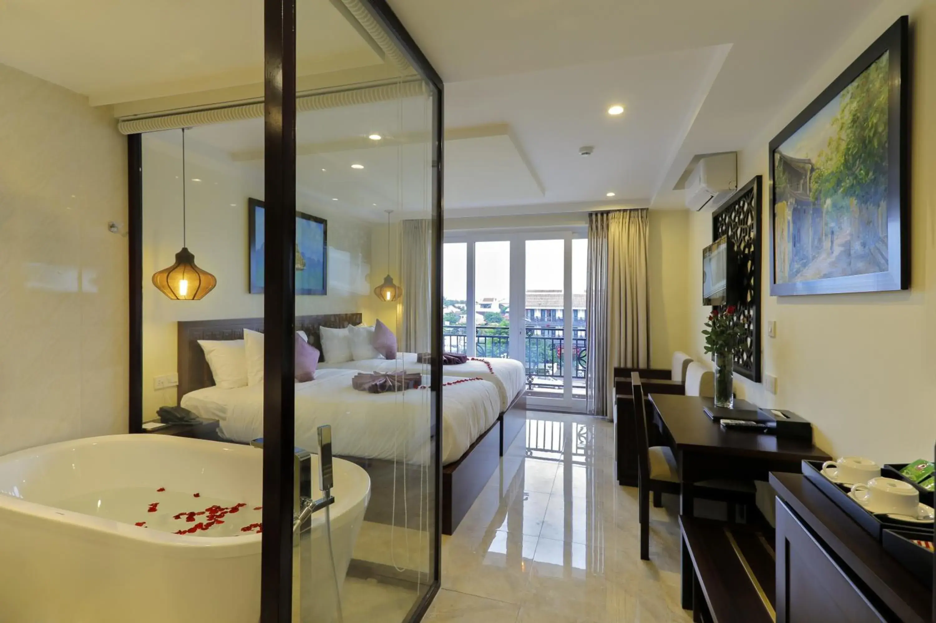 Deluxe Double or Twin Room with River View in River Suites Hoi An Deluxe Double or Twin Room with River View in River Suites Hoi An