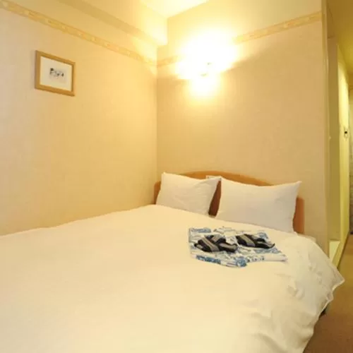 Bed in Hotel Benex Yonezawa