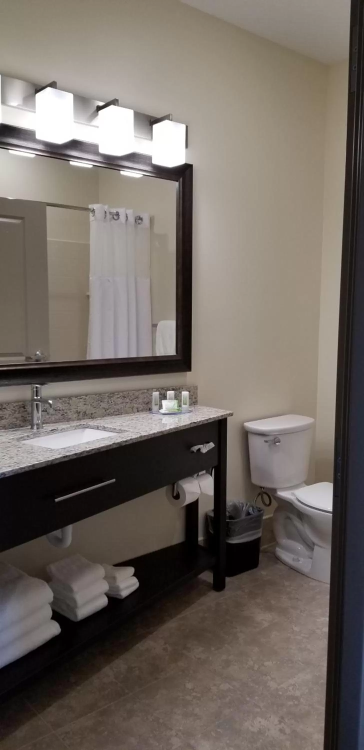 Bathroom in AmericInn by Wyndham Sioux Falls North