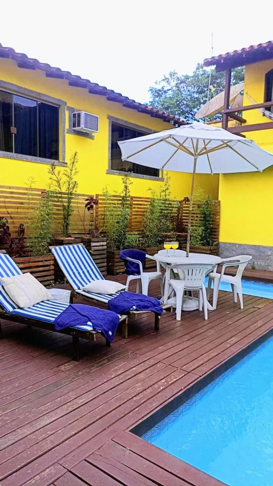 Patio, Swimming Pool in Hibiscos Pousada