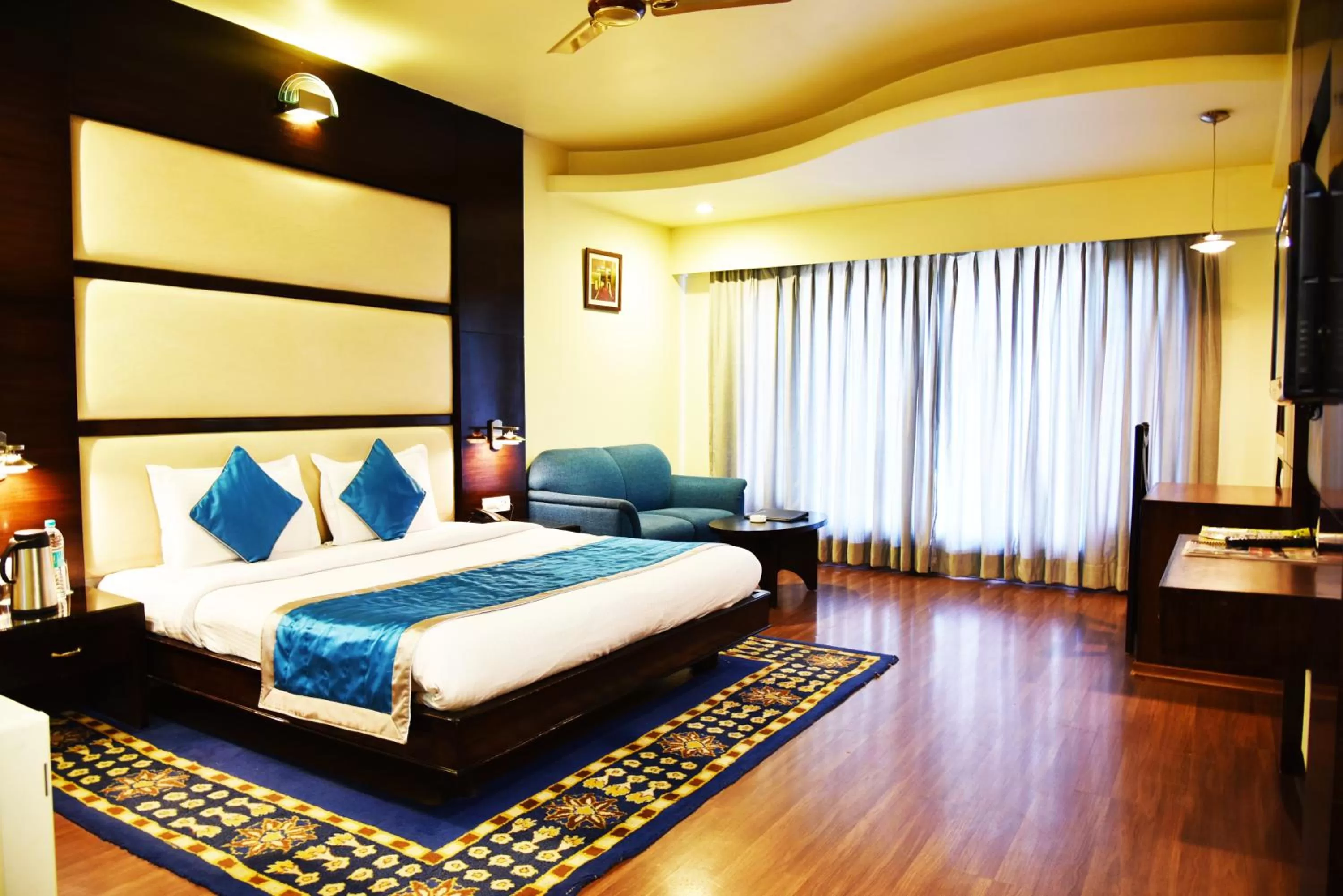 Bedroom, Bed in Indraprastha Resort - Centrally Heated Rooms, with Gym, Games & Spa