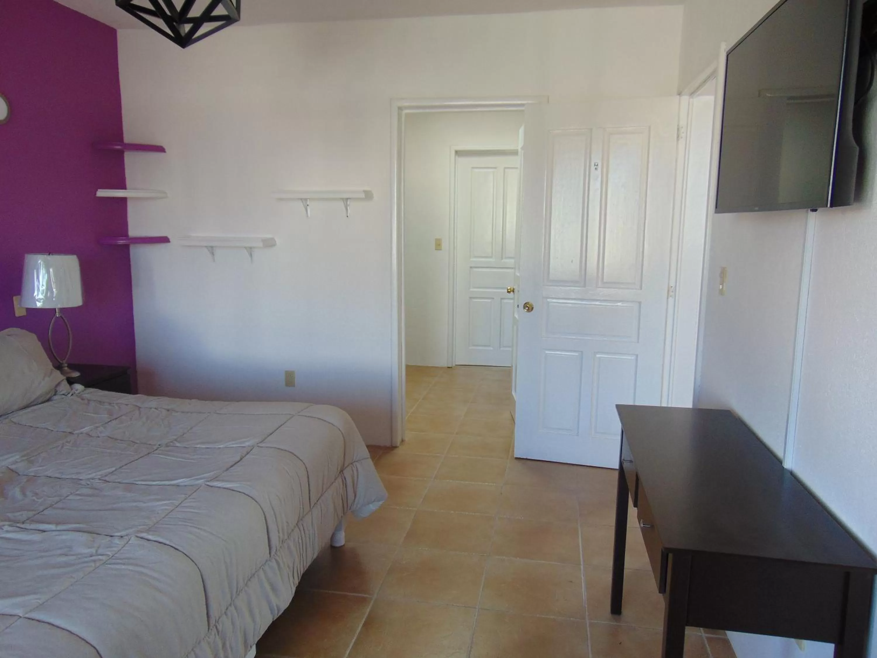 TV and multimedia, Bed in Hotel Feregrino